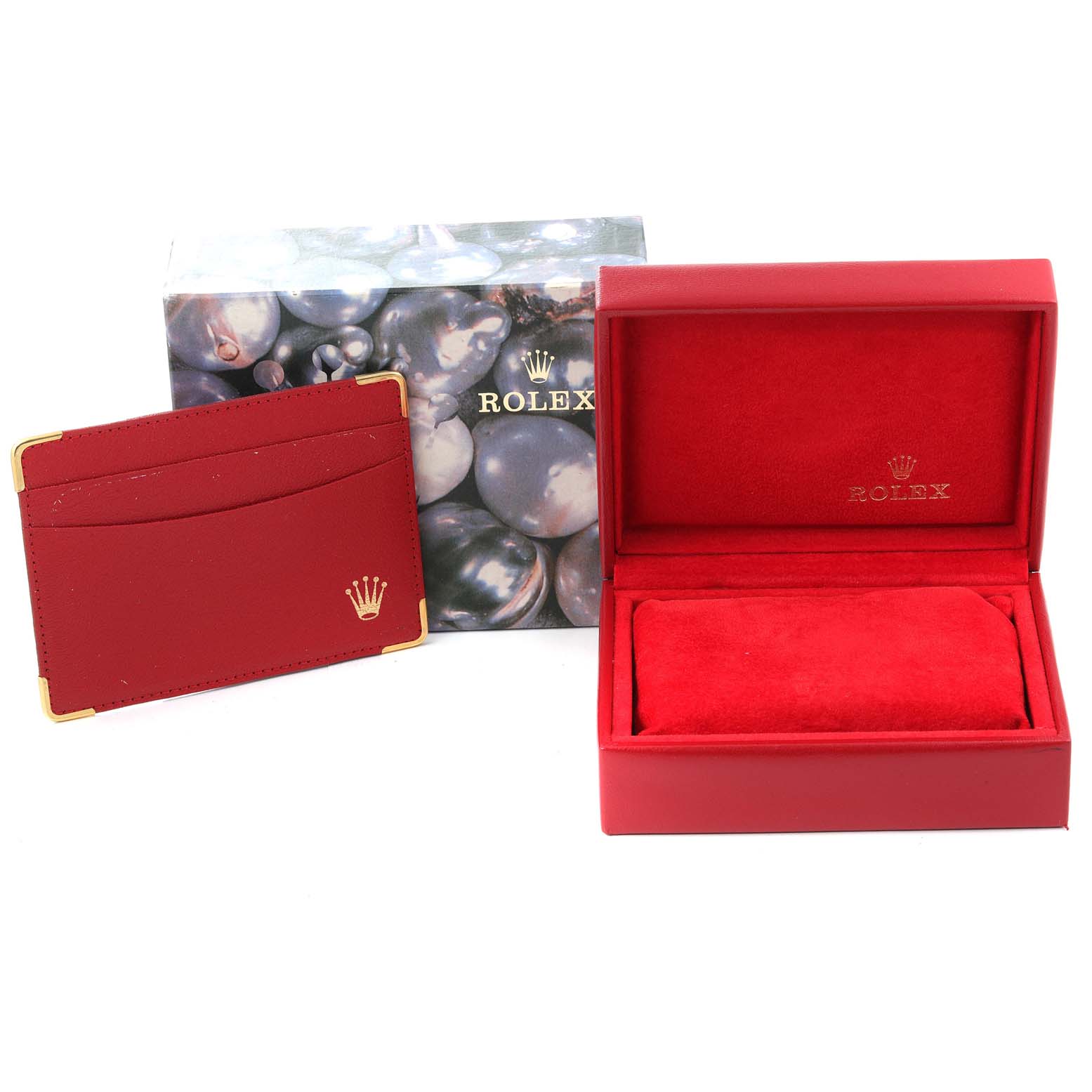 The image shows a Rolex Datejust 69174 Women
s Stainless Steel Silver Dial 69174 Women
s Stainless Steel Silver Dial watch box, a cardholder, and outer packaging from a front angle.