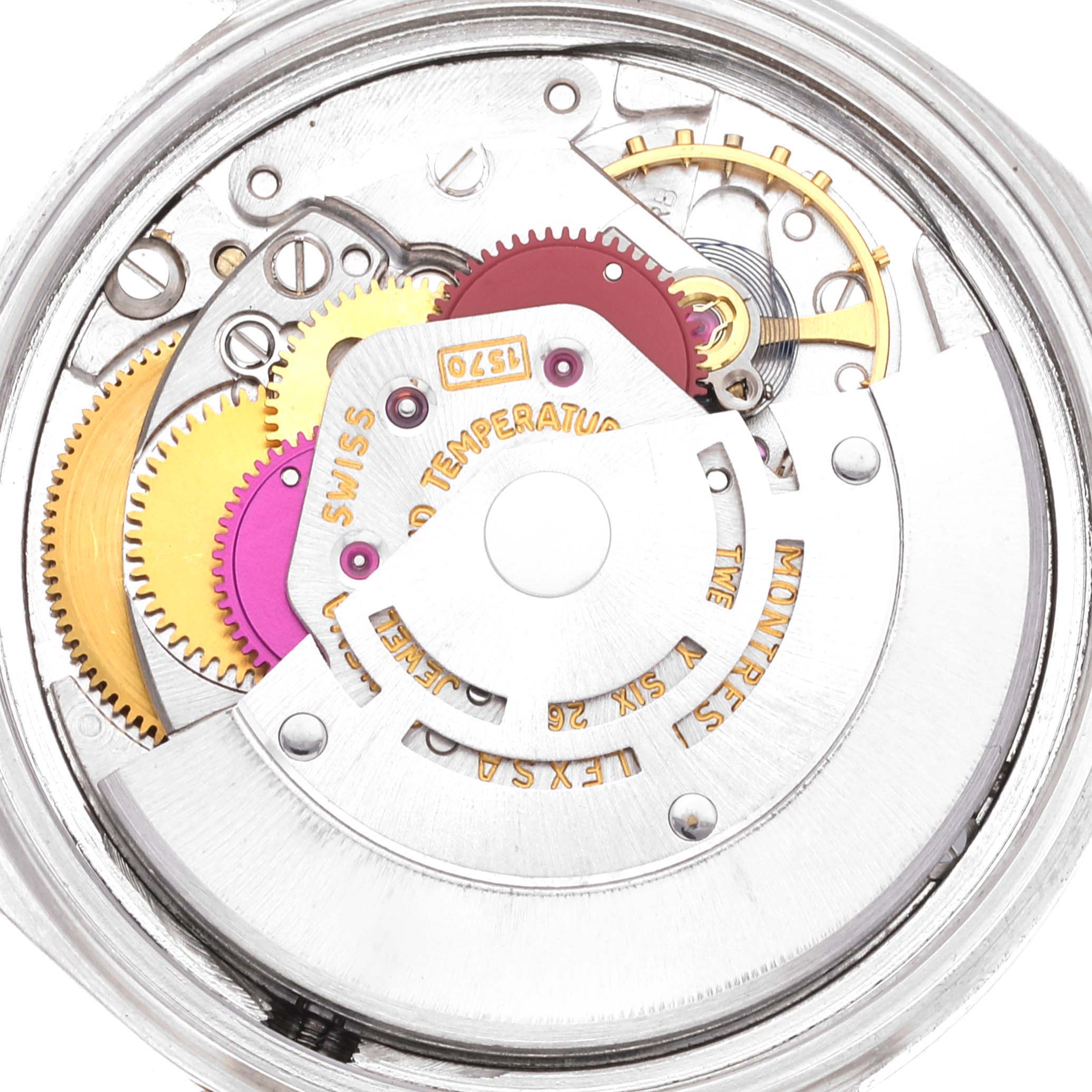 This image shows a close-up of the intricate internal mechanism of the Rolex Vintage Collection 1601 Men's Steel and Gold (two tone) Champagne Dial 1601 Men's Steel and Gold (two tone) Champagne Dial watch.