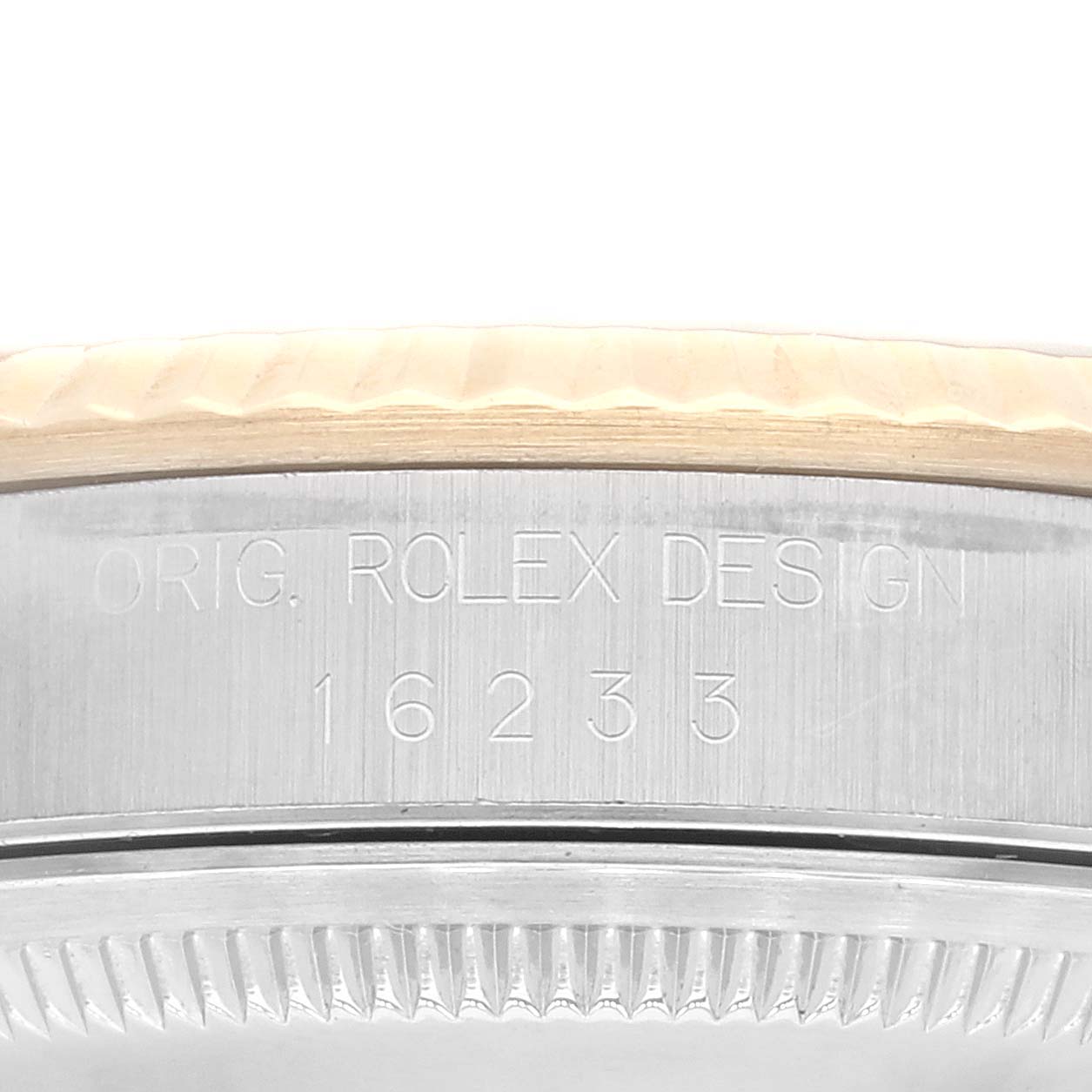 The image shows a close-up of the model number and bezel of a Rolex Datejust 16233 Men's Steel and Gold (two tone) White Dial 16233 Men's Steel and Gold (two tone) White Dial watch.