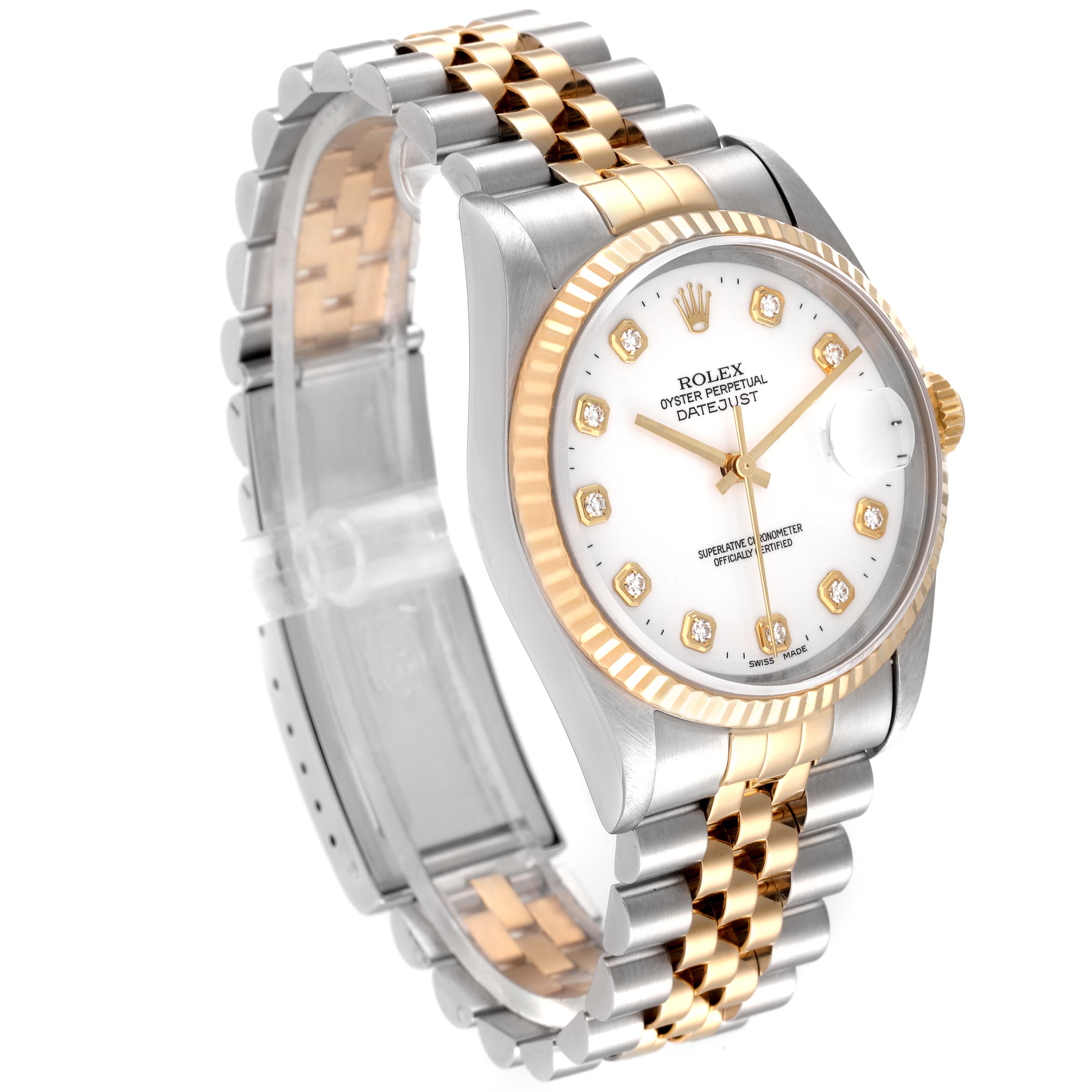 The image shows a Rolex Datejust 16233 Men's Steel and Gold (two tone) White Dial 16233 Men's Steel and Gold (two tone) White Dial watch with a two-tone metal band, white dial, and gold fluted bezel at an angled side view.