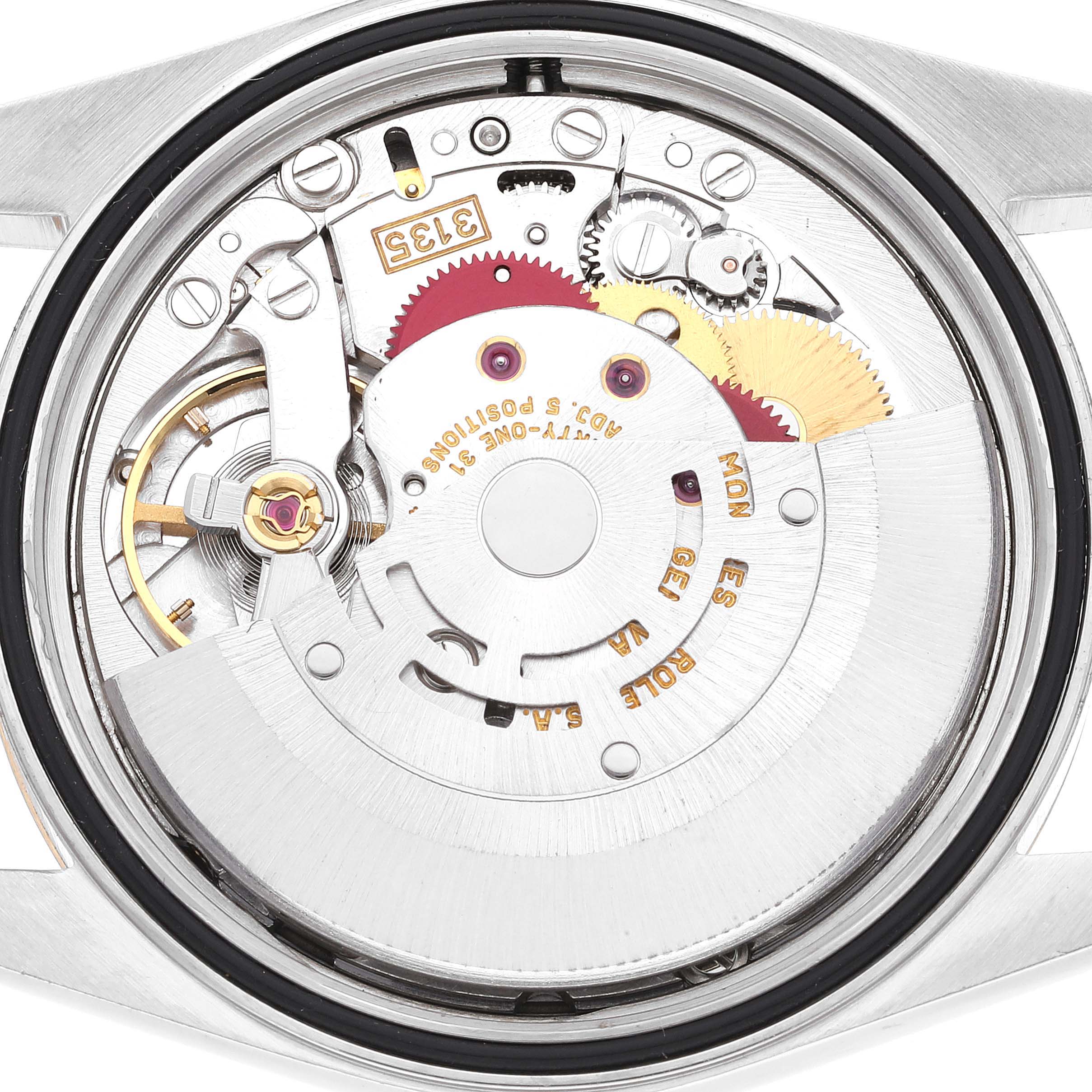 This image shows the back of a Rolex Datejust 16233 Men's Steel and Gold (two tone) White Dial 16233 Men's Steel and Gold (two tone) White Dial watch, revealing the internal movement mechanism.