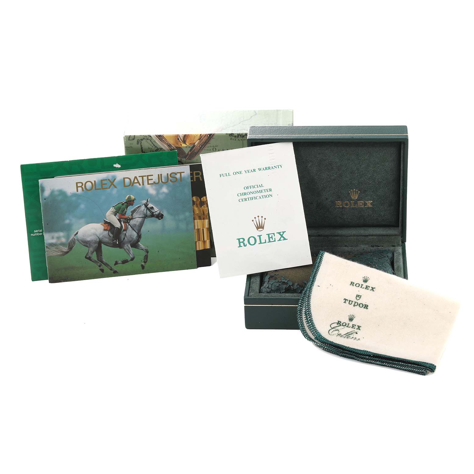 This image shows Rolex Datejust 16233 Men's Steel and Gold (two tone) Champagne Dial 16233 Men's Steel and Gold (two tone) Champagne Dial model packaging, booklets, warranty card, and cleaning cloth.