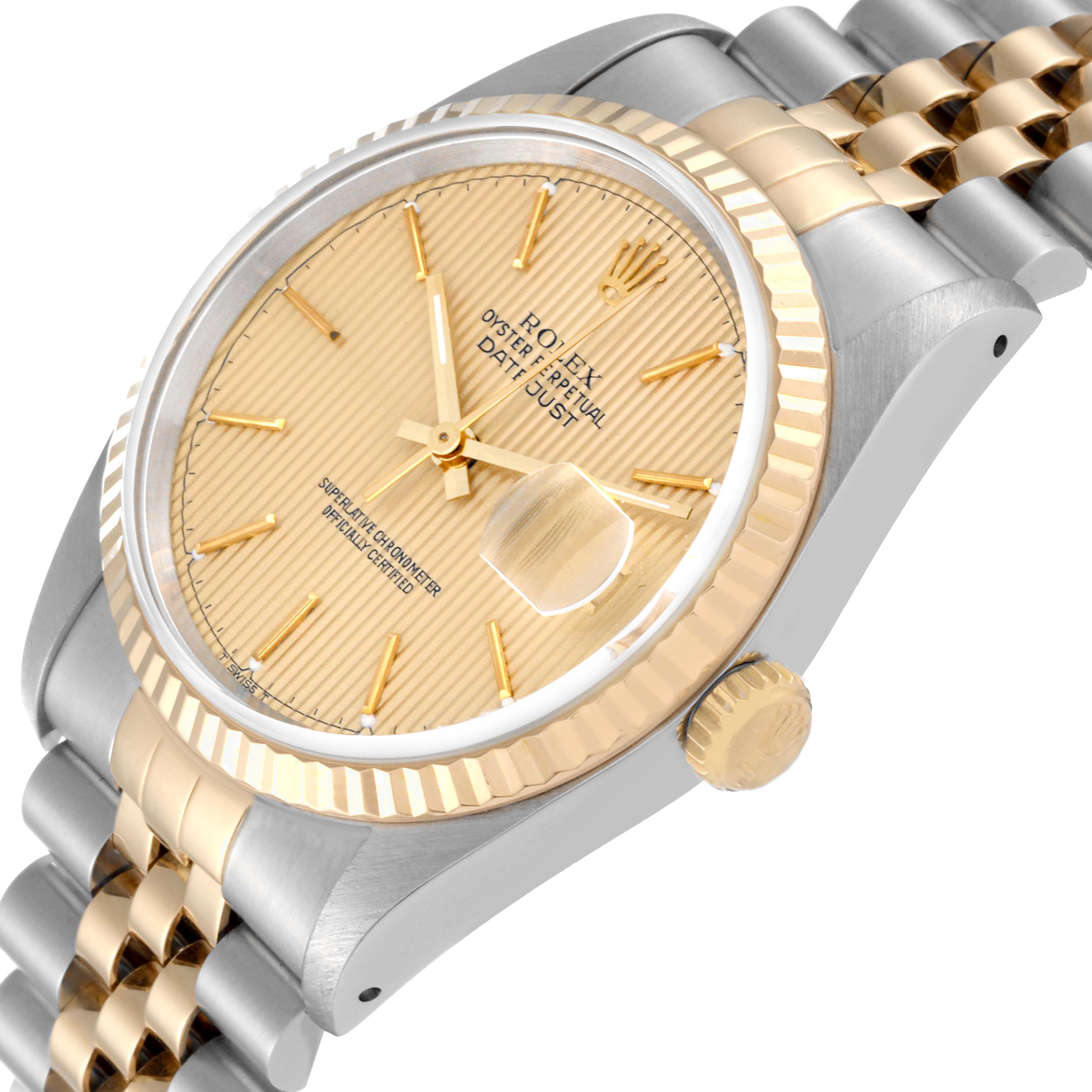 The image shows a close-up, angled view of the face and part of the bracelet of a Rolex Datejust 16233 Men's Steel and Gold (two tone) Champagne Dial 16233 Men's Steel and Gold (two tone) Champagne Dial watch.