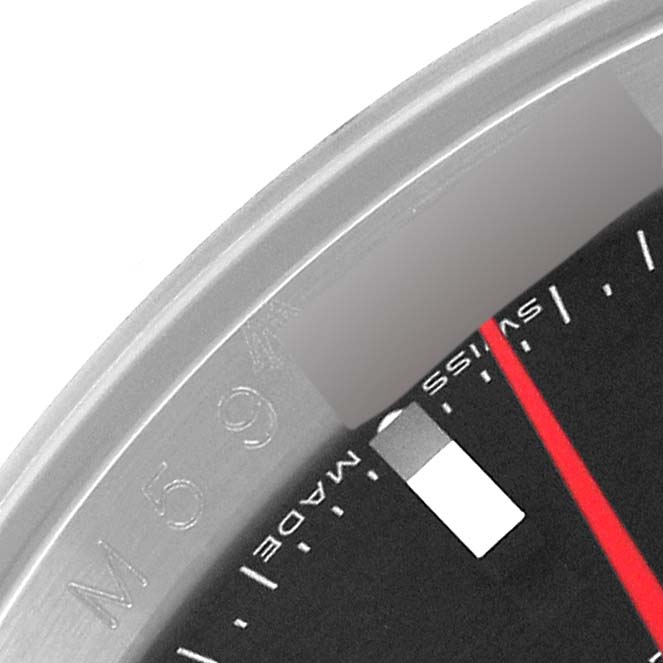 This close-up image shows the bezel, minute markers, and part of the dial of a Rolex Turn-o-Graph 116264 Men's Stainless Steel Black Dial 116264 Men's Stainless Steel Black Dial watch.