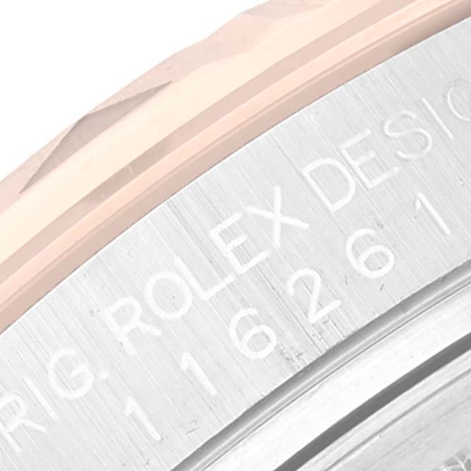 This image shows a close-up of the bezel and engraved text on the side of the Rolex Turn-o-Graph 116261 Men's Steel and Gold (two tone) Black Dial 116261 Men's Steel and Gold (two tone) Black Dial model.