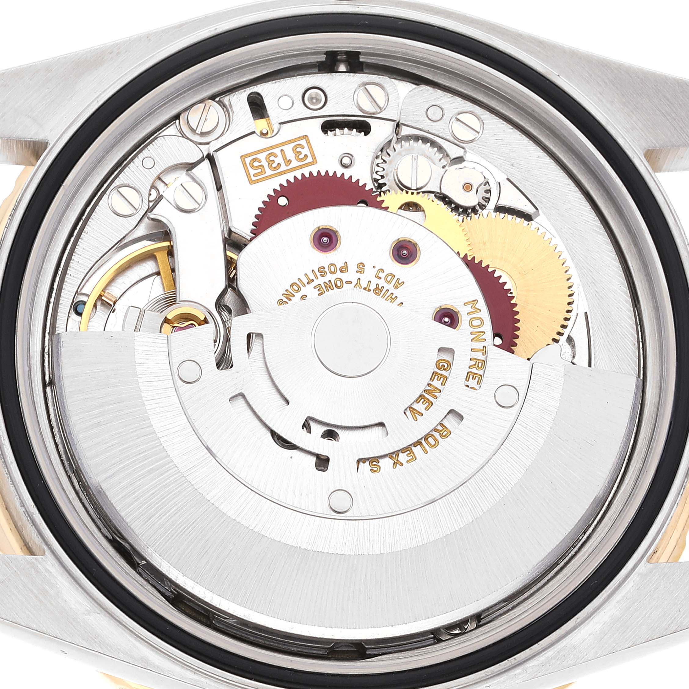 This is an interior view of a Rolex Turn-o-Graph 16263 Men
s Steel and Gold (two tone) Champagne Dial 16263 Men
s Steel and Gold (two tone) Champagne Dial watch movement, displaying gears and mechanical parts.