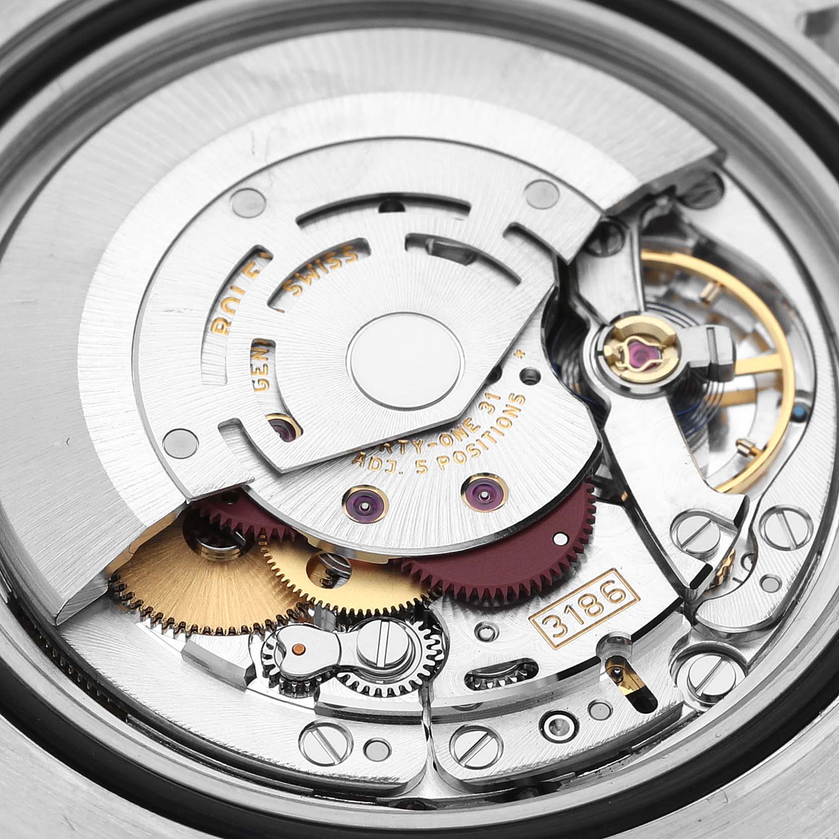 This image shows a close-up view of the Rolex GMT-Master 116710 Men
s Stainless Steel Black Dial 116710 Men
s Stainless Steel Black Dial watch movement, displaying its intricate gears and mechanisms.