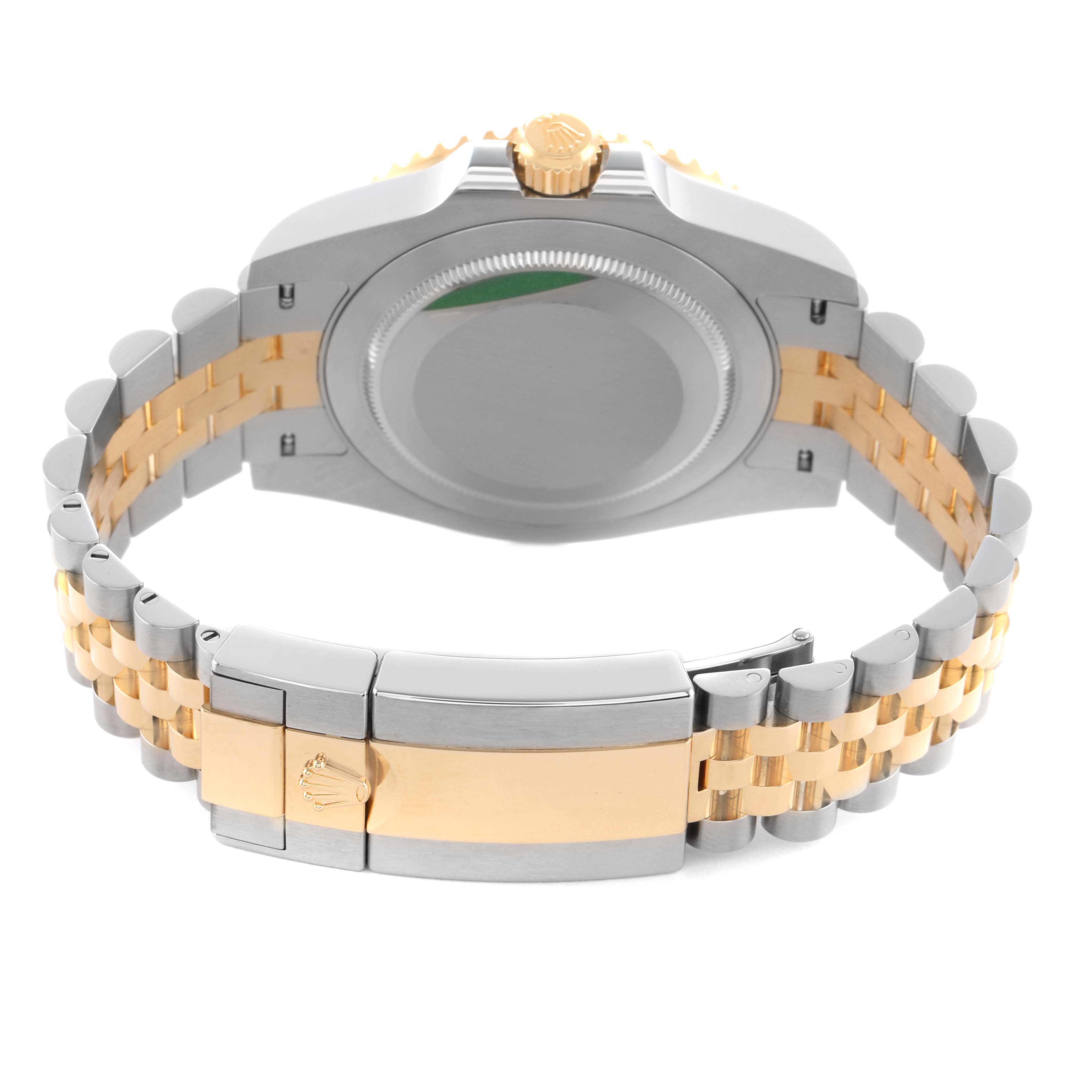 The image shows the back of a Rolex GMT-Master 126713 Men's Steel and Gold (two tone) Black Dial watch with a two-tone bracelet and clasp, viewed from the underside.