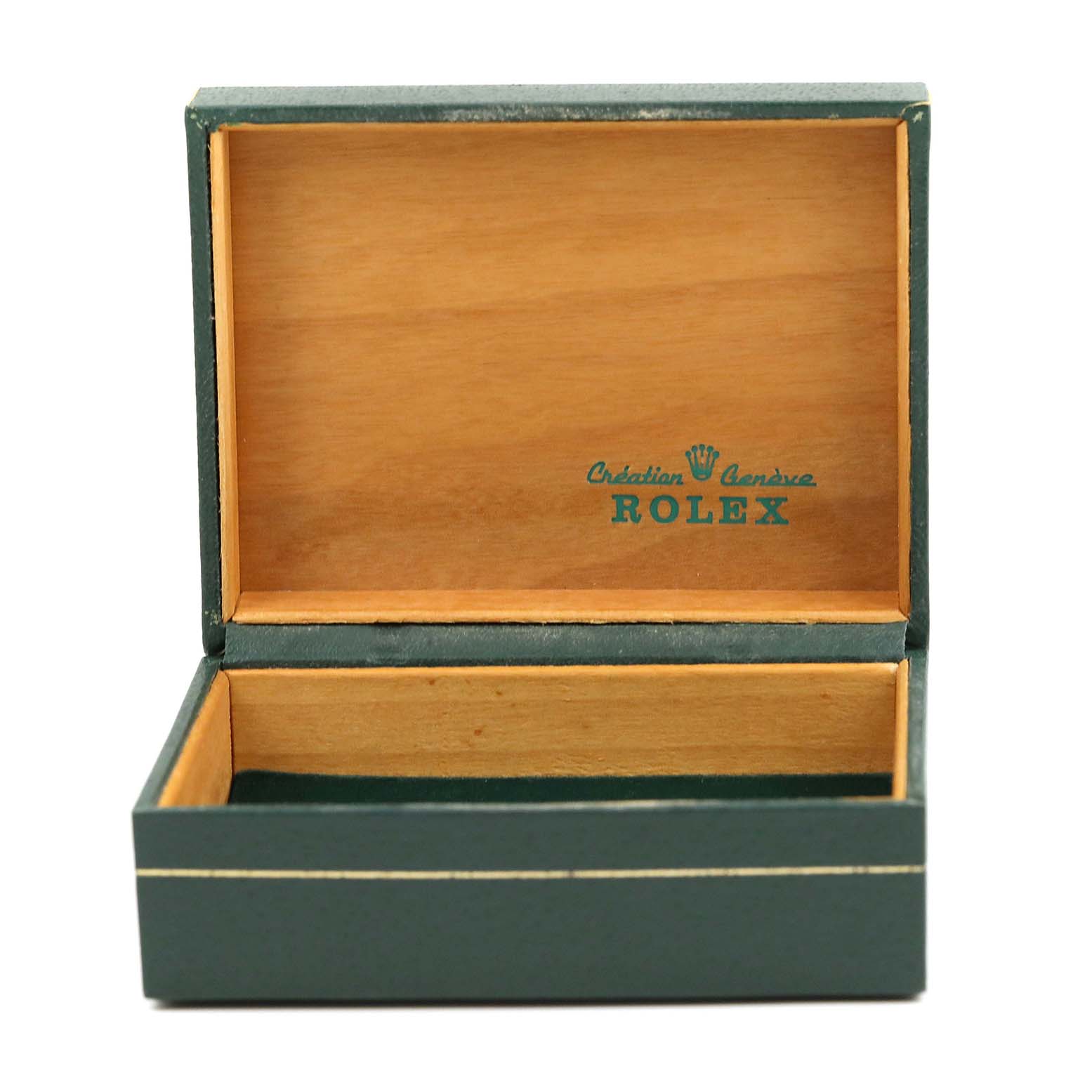 This image shows an open Rolex box from the Vintage Collection model, displaying its interior.