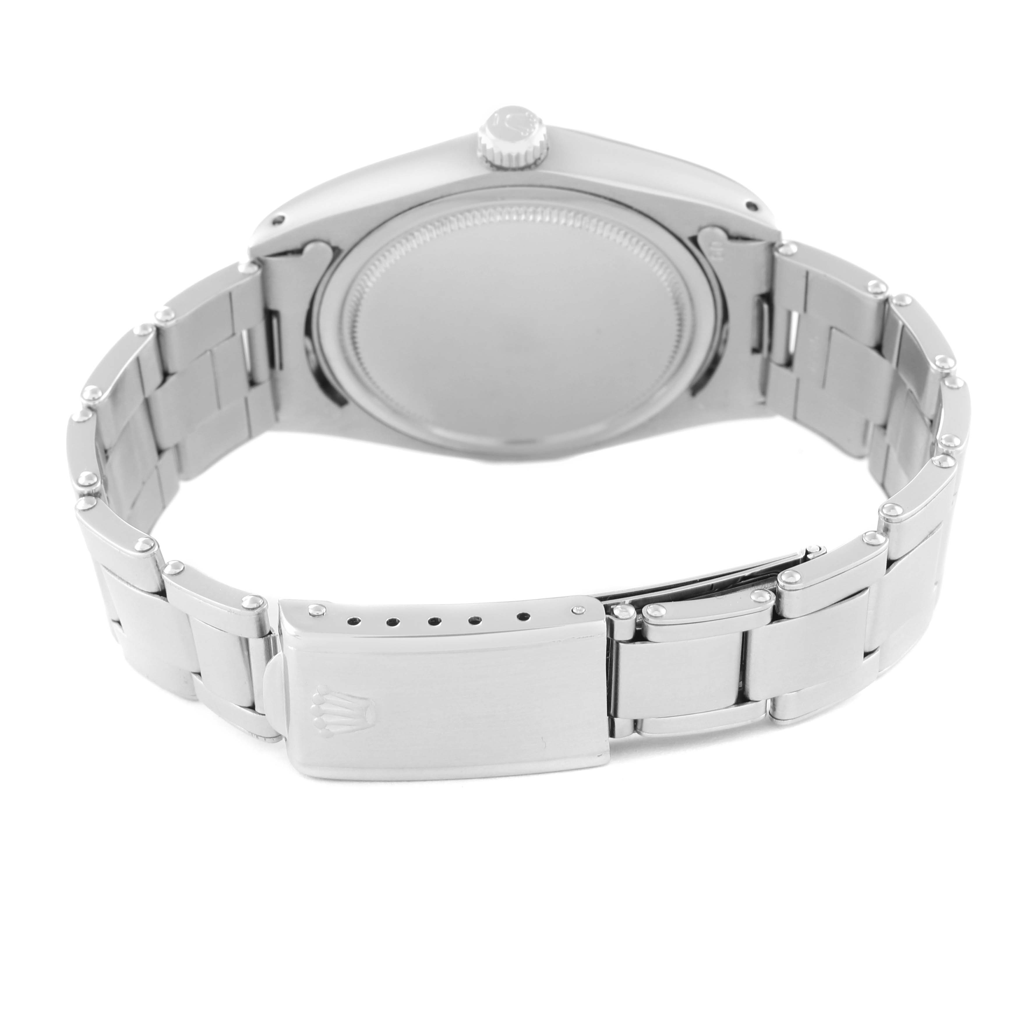 This image shows the back view of a Rolex Vintage Collection 6694 Men's Stainless Steel Silver Dial 6694 Men's Stainless Steel Silver Dial watch, highlighting its case back and metal bracelet with a clasp.