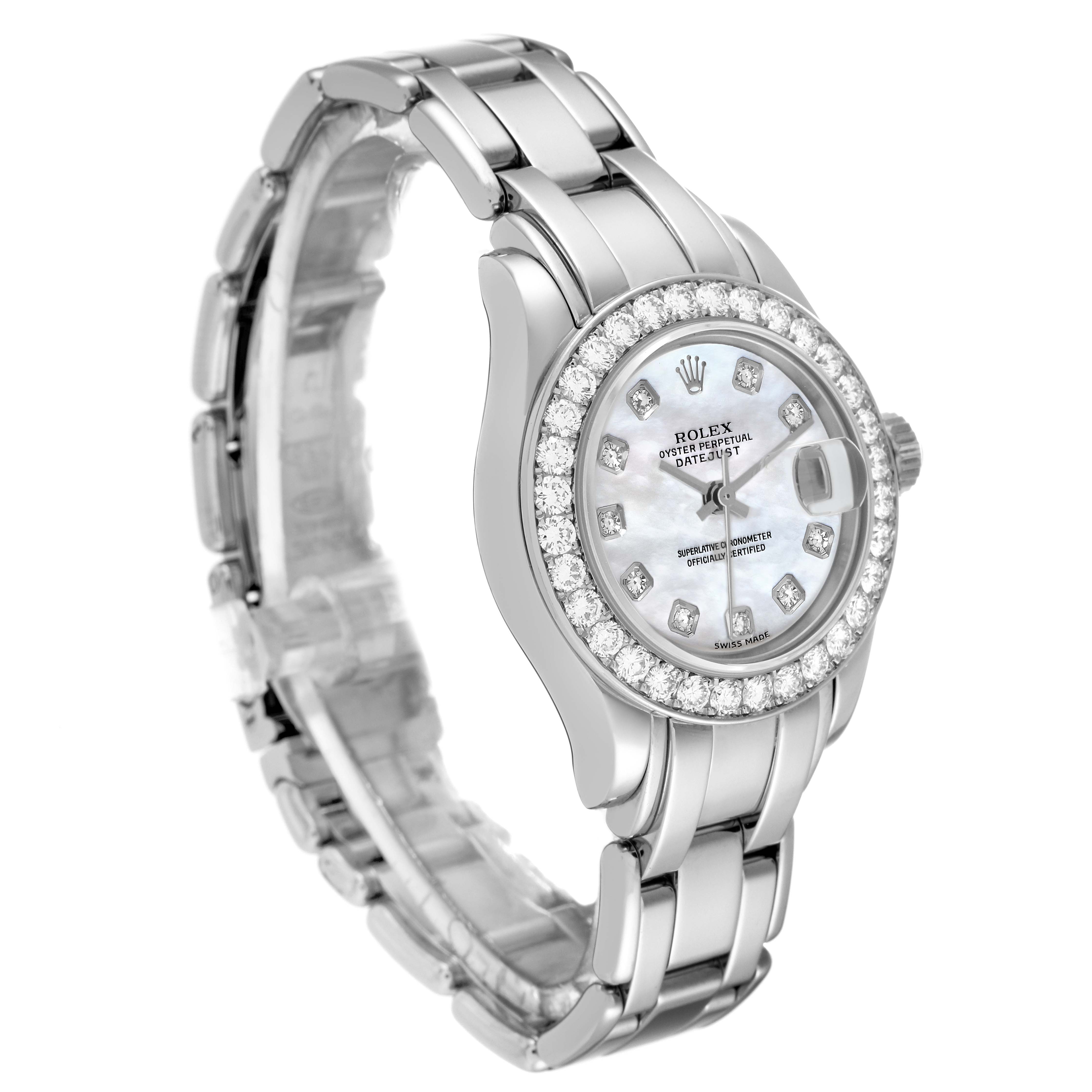 The Rolex Pearlmaster 69299 Women's White Gold Mother of Pearl Dial 69299 Women's White Gold Mother of Pearl Dial watch is shown at a slight angle, displaying the dial, bezel with diamonds, and the bracelet.