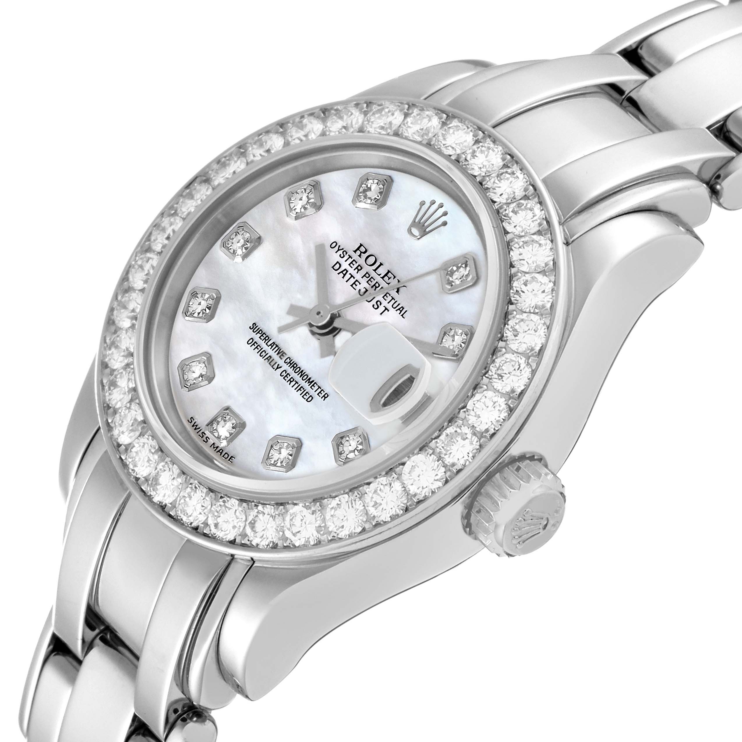 The Rolex Pearlmaster 69299 Women's White Gold Mother of Pearl Dial 69299 Women's White Gold Mother of Pearl Dial watch is shown at an angled close-up, focusing on its dial, bezel, and partial bracelet.