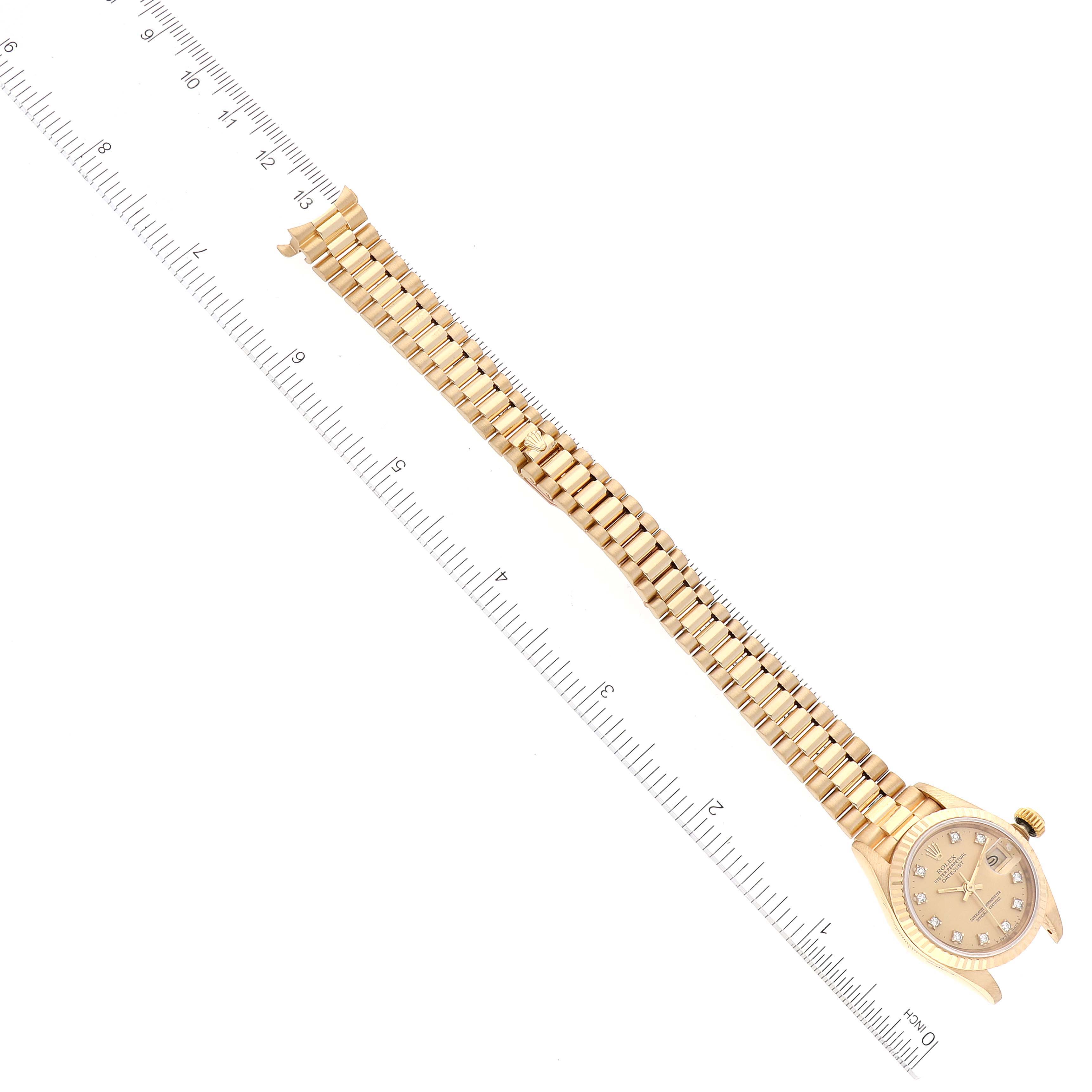The image shows a top-down view of a Rolex President 69178 Women
s Yellow Gold Champagne Dial 69178 Women
s Yellow Gold Champagne Dial model watch, displaying the full band and face.