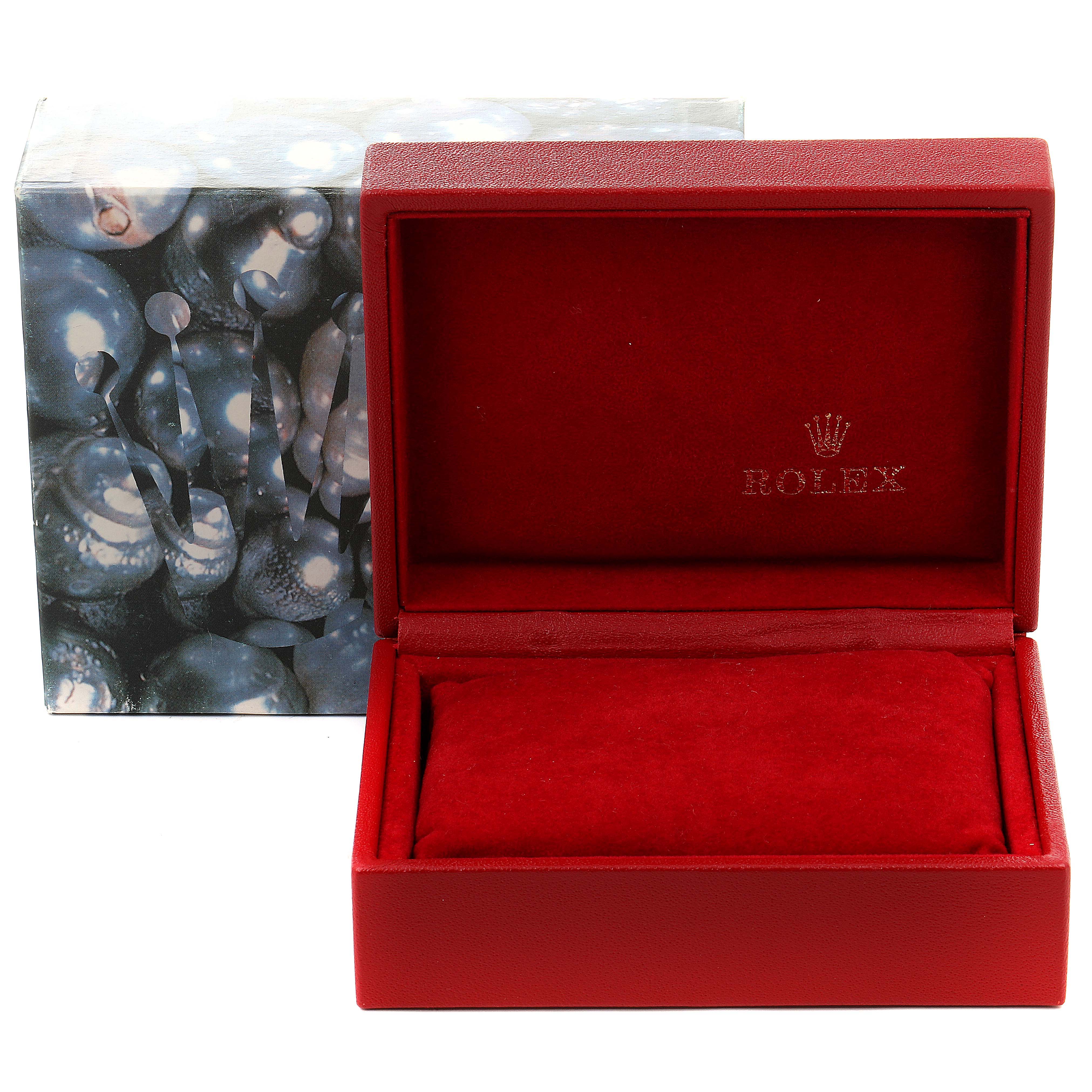 This image shows a red Rolex box for the President model watch, open to reveal a cushion inside.