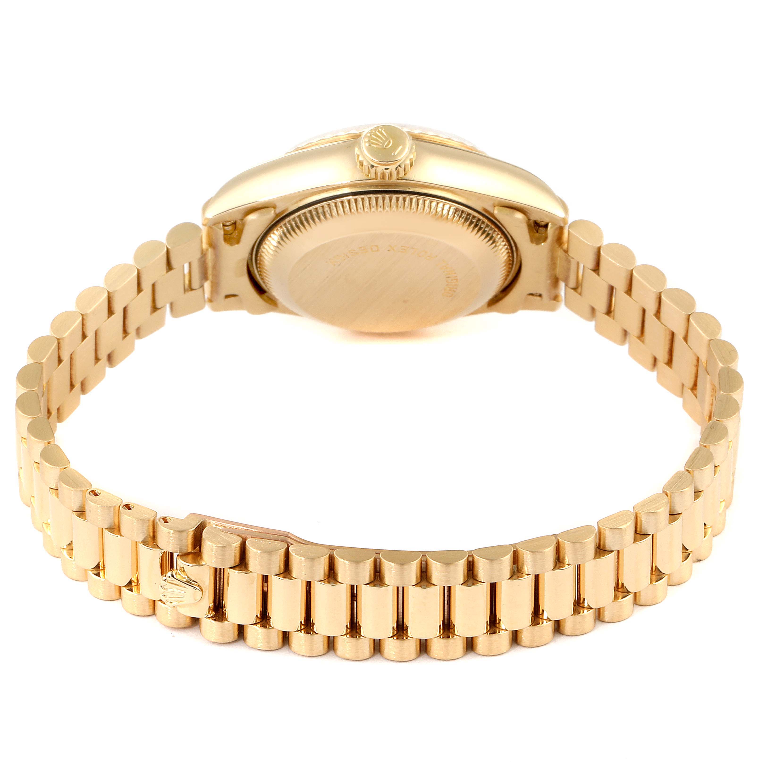 This image shows the back of a Rolex President 69178 Women
s Yellow Gold Champagne Dial 69178 Women
s Yellow Gold Champagne Dial model watch, focusing on the case back and the bracelet.