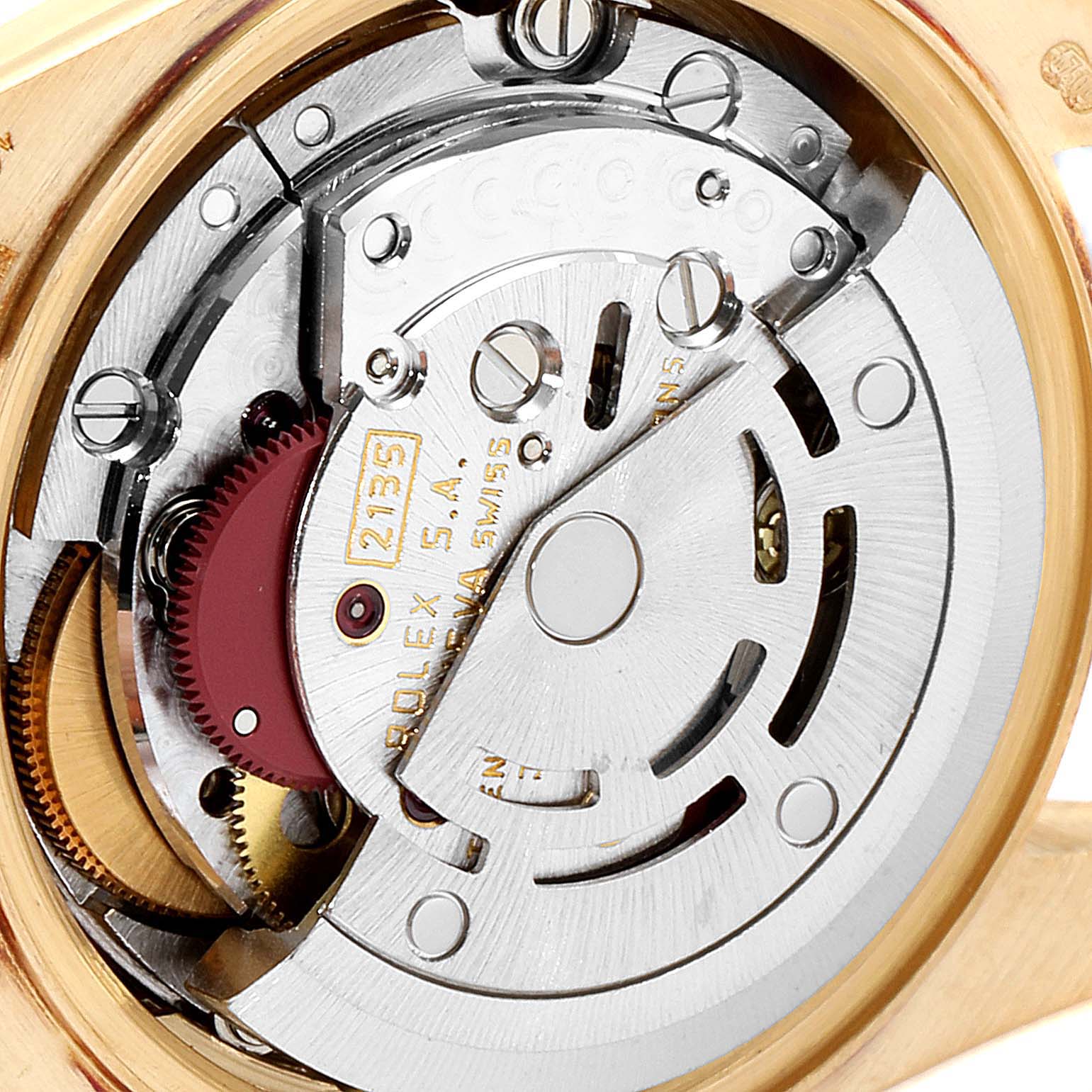 This image shows the internal mechanism of a Rolex President 69178 Women
s Yellow Gold Champagne Dial 69178 Women
s Yellow Gold Champagne Dial watch, specifically the movement components from a close-up angle.