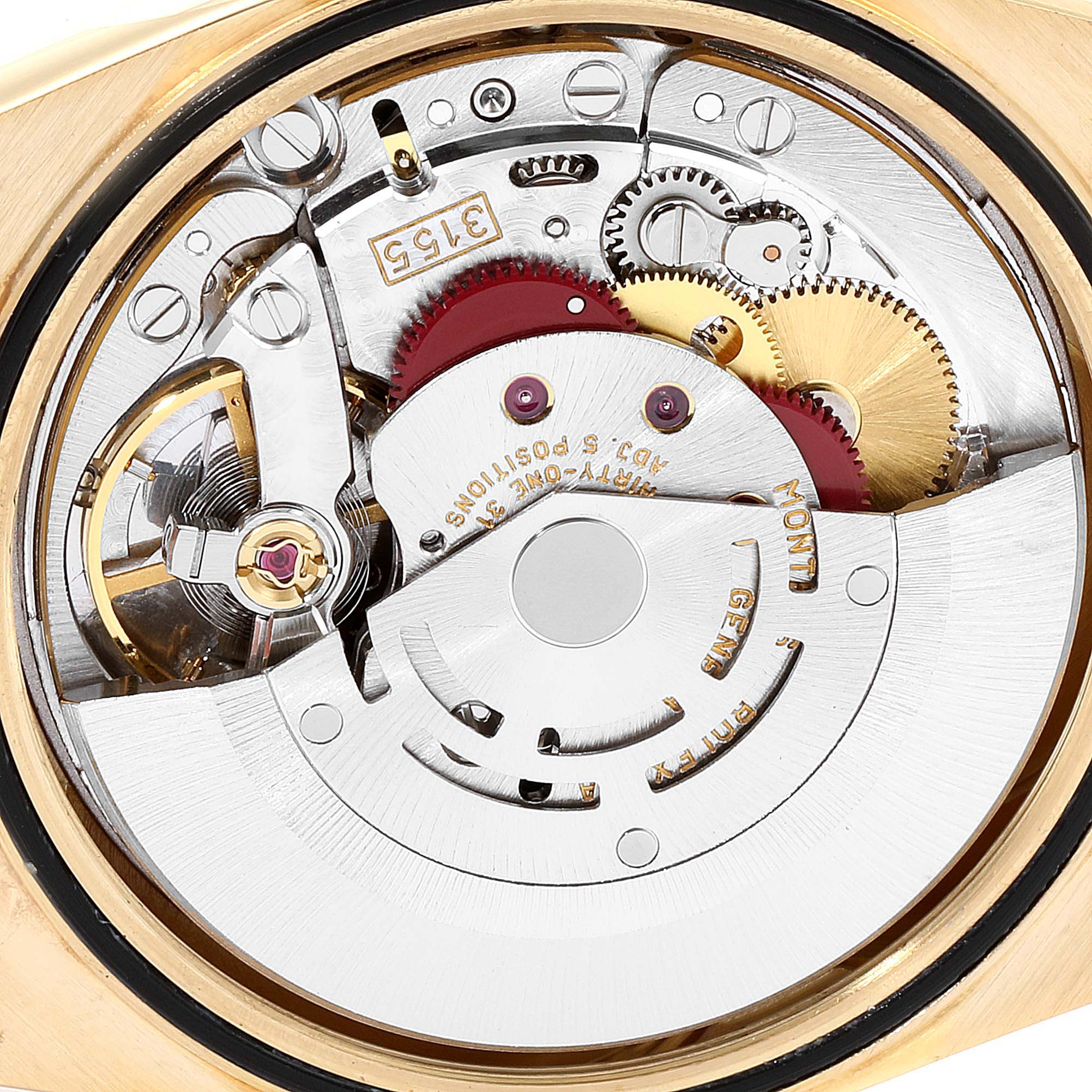 This image shows the intricate internal mechanism of a Rolex President 18248 Men
s Yellow Gold Champagne Dial 18248 Men
s Yellow Gold Champagne Dial model watch from a close-up angle.