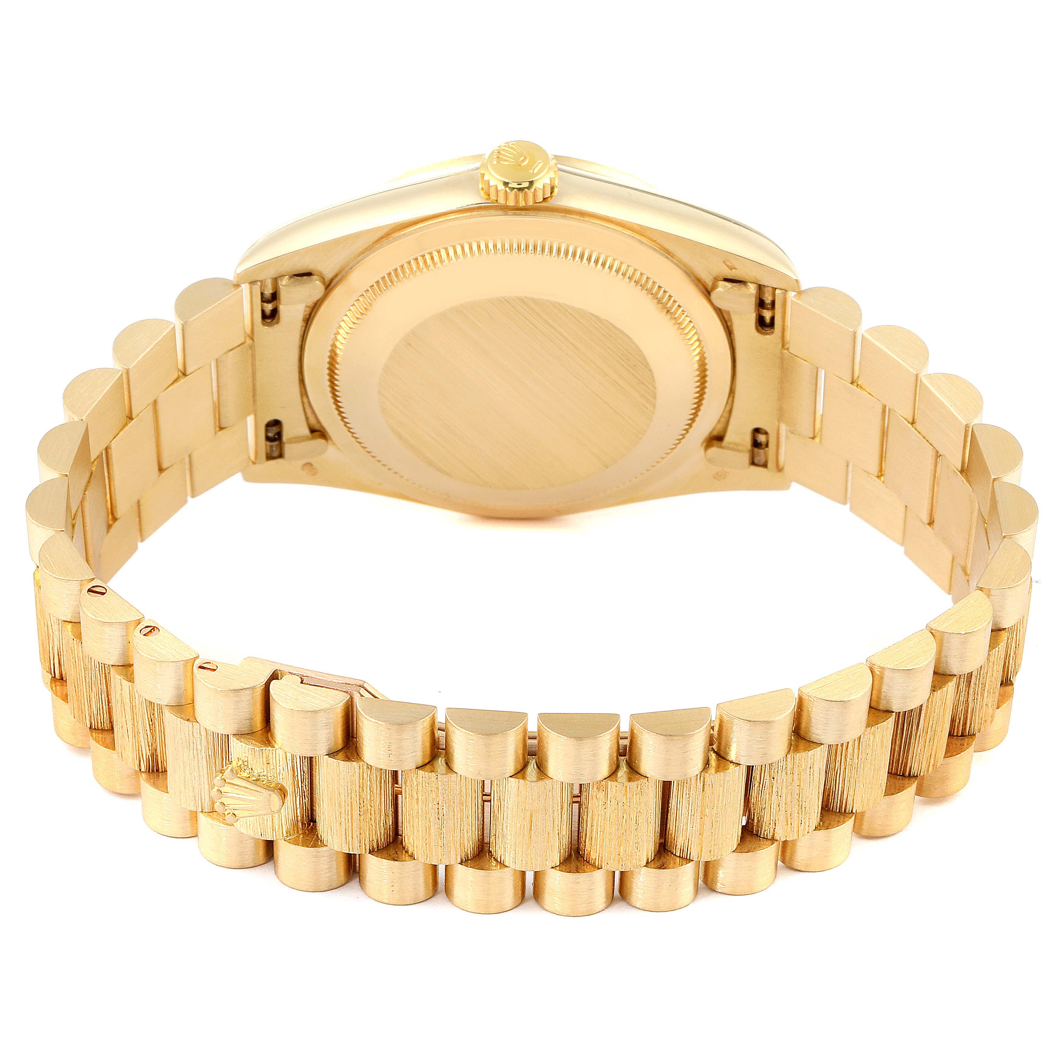 The image shows the back view and bracelet of the Rolex President 18248 Men
s Yellow Gold Champagne Dial 18248 Men
s Yellow Gold Champagne Dial model watch.
