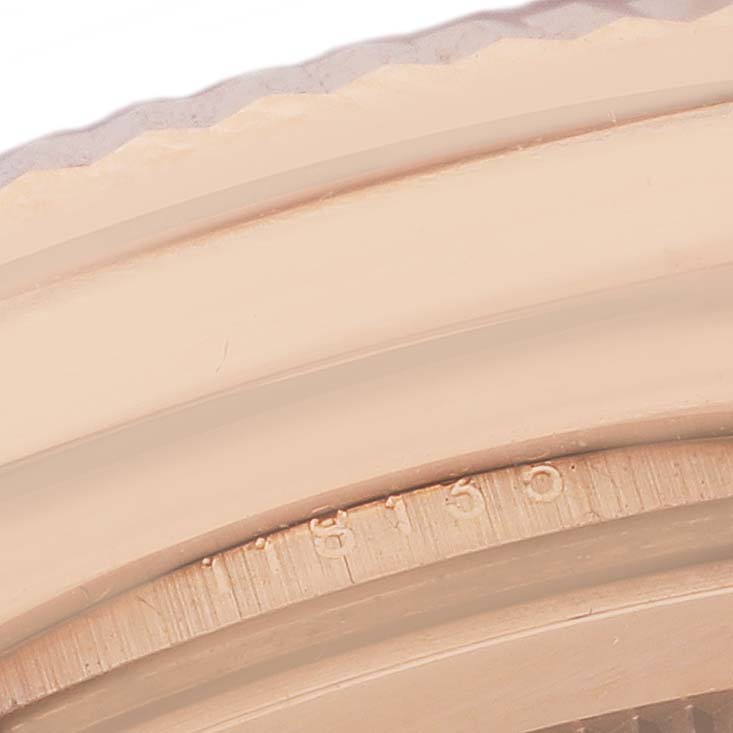 The image shows a close-up of the bezel and part of the case edge of the Rolex President 118135 Men's Rose Gold Brown Dial 118135 Men's Rose Gold Brown Dial model watch.