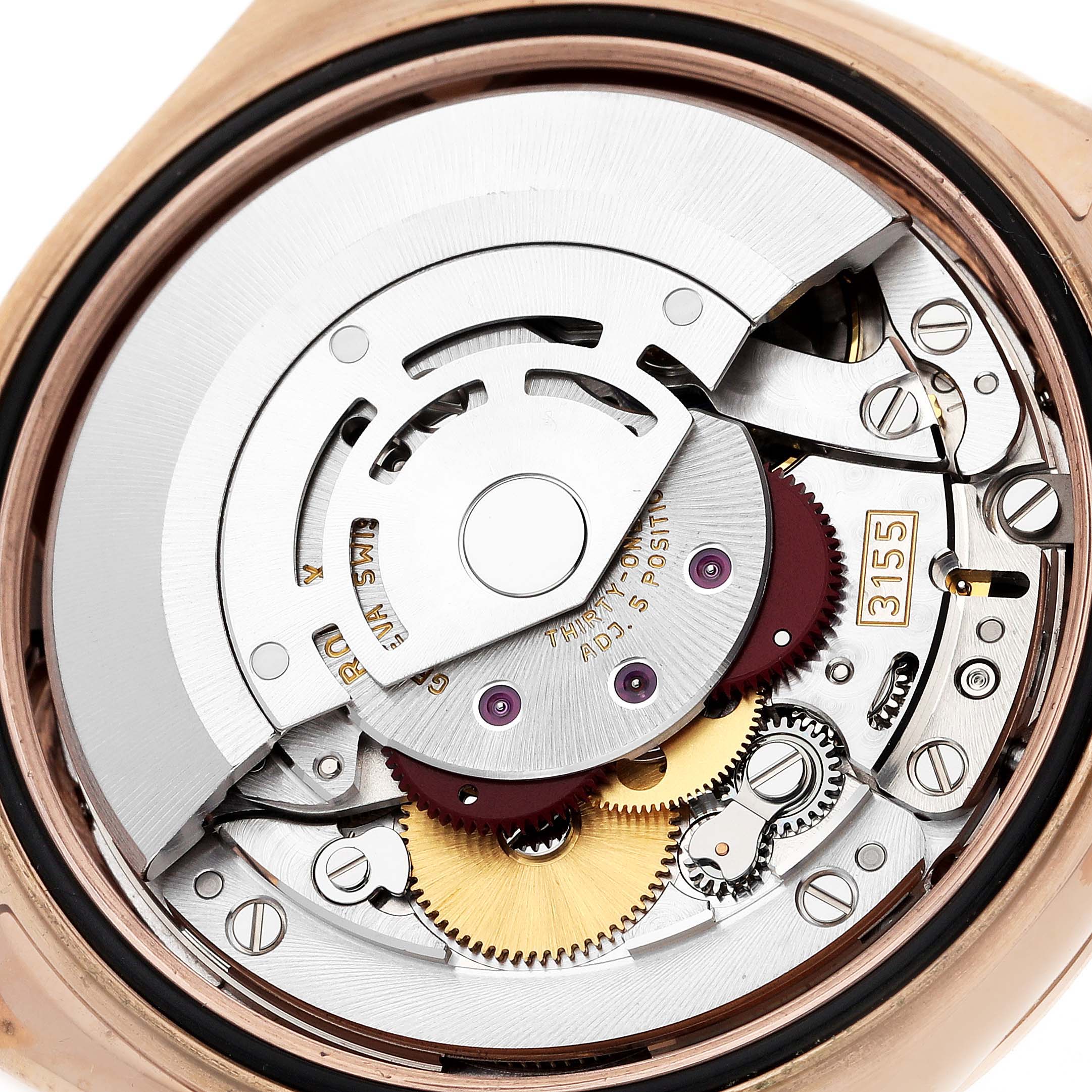 This image shows the intricate internal mechanism of a Rolex President 118135 Men's Rose Gold Brown Dial 118135 Men's Rose Gold Brown Dial watch viewed from the back.
