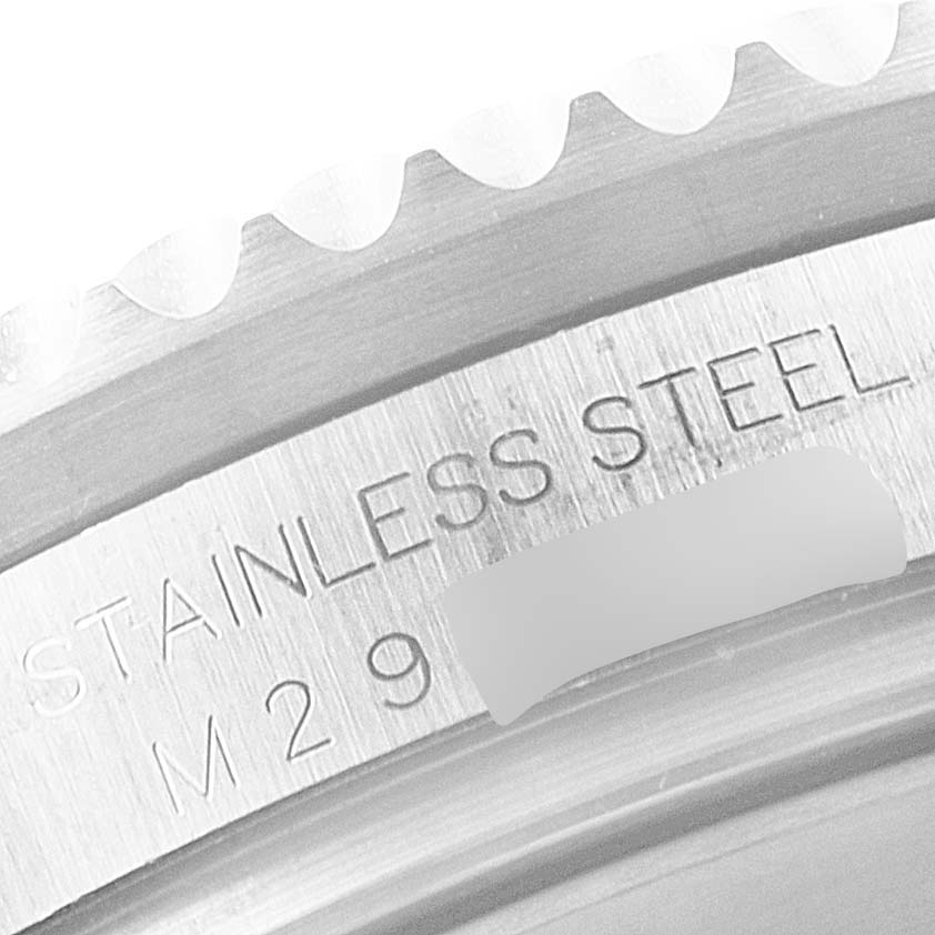 The image shows a close-up of the bezel edge and part of the engraved stainless steel text on the Rolex Sea-Dweller 16600 Men's Stainless Steel Black Dial 16600 Men's Stainless Steel Black Dial.