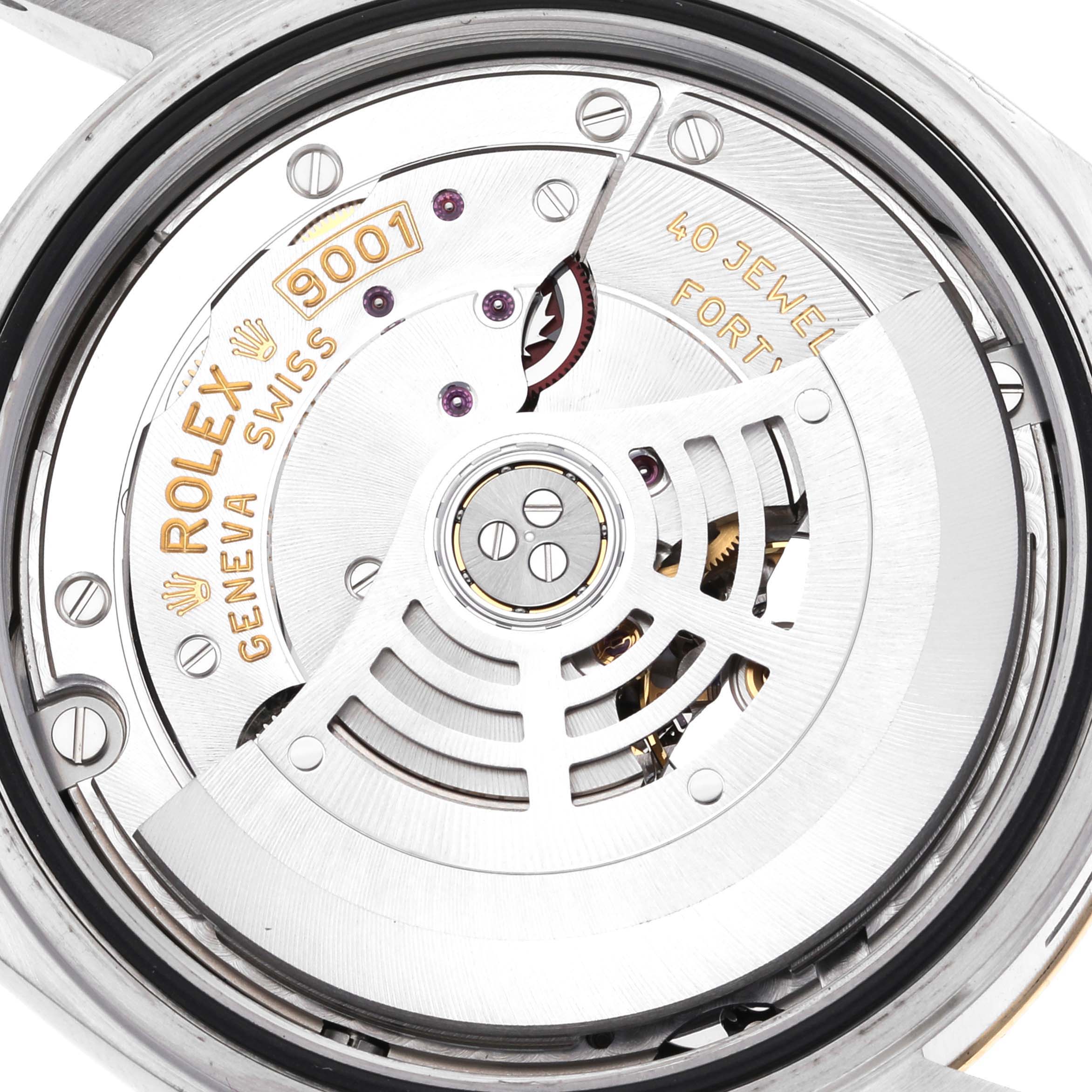 This is an angled close-up view of the movement mechanism inside the Rolex Sky-Dweller 326933 Men
s Steel and Gold (two tone) White Dial 326933 Men
s Steel and Gold (two tone) White Dial watch.