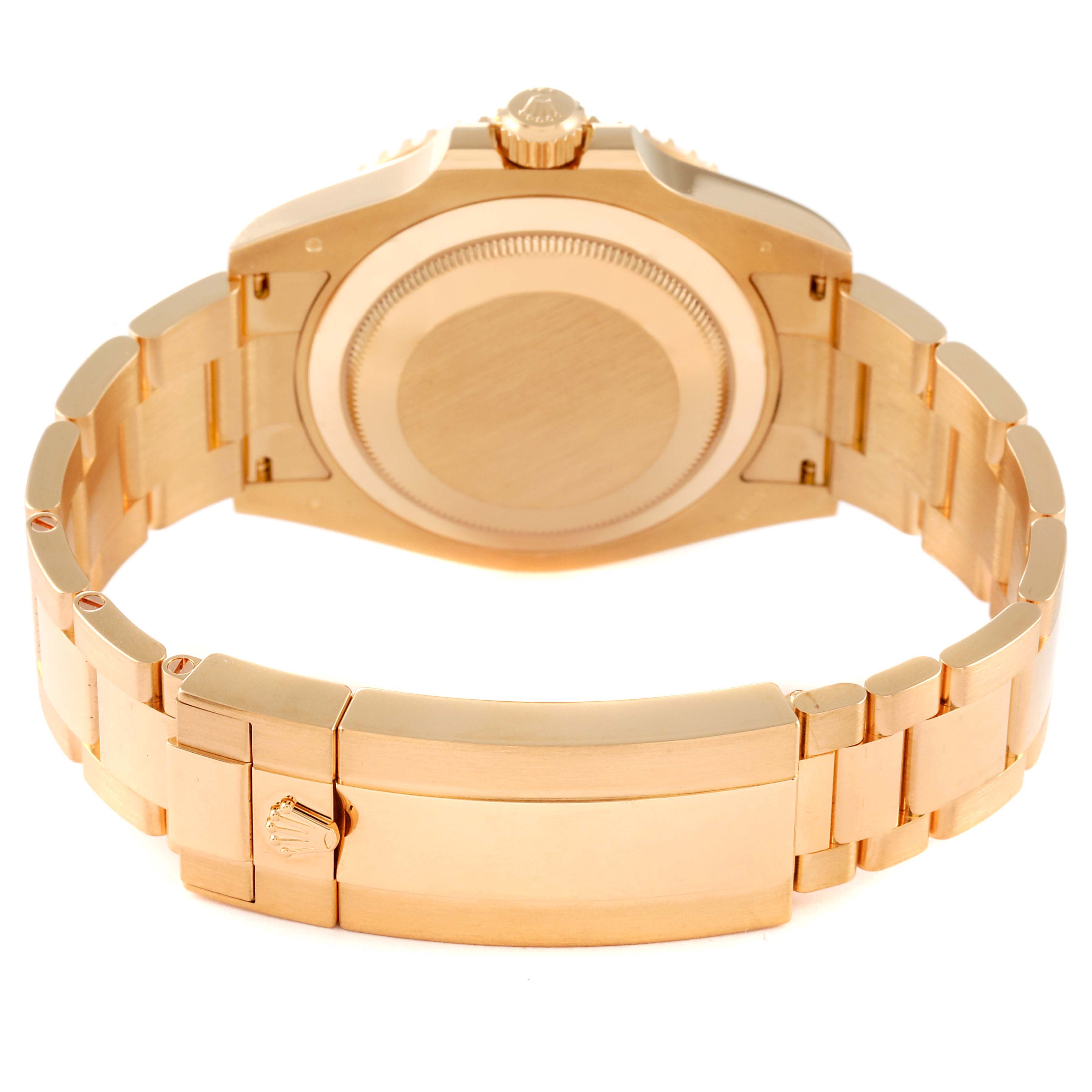 The image shows the back of a Rolex Submariner 126618 Men's Yellow Gold Blue Dial 126618 Men's Yellow Gold Blue Dial watch, including the case back, crown, and bracelet clasp.