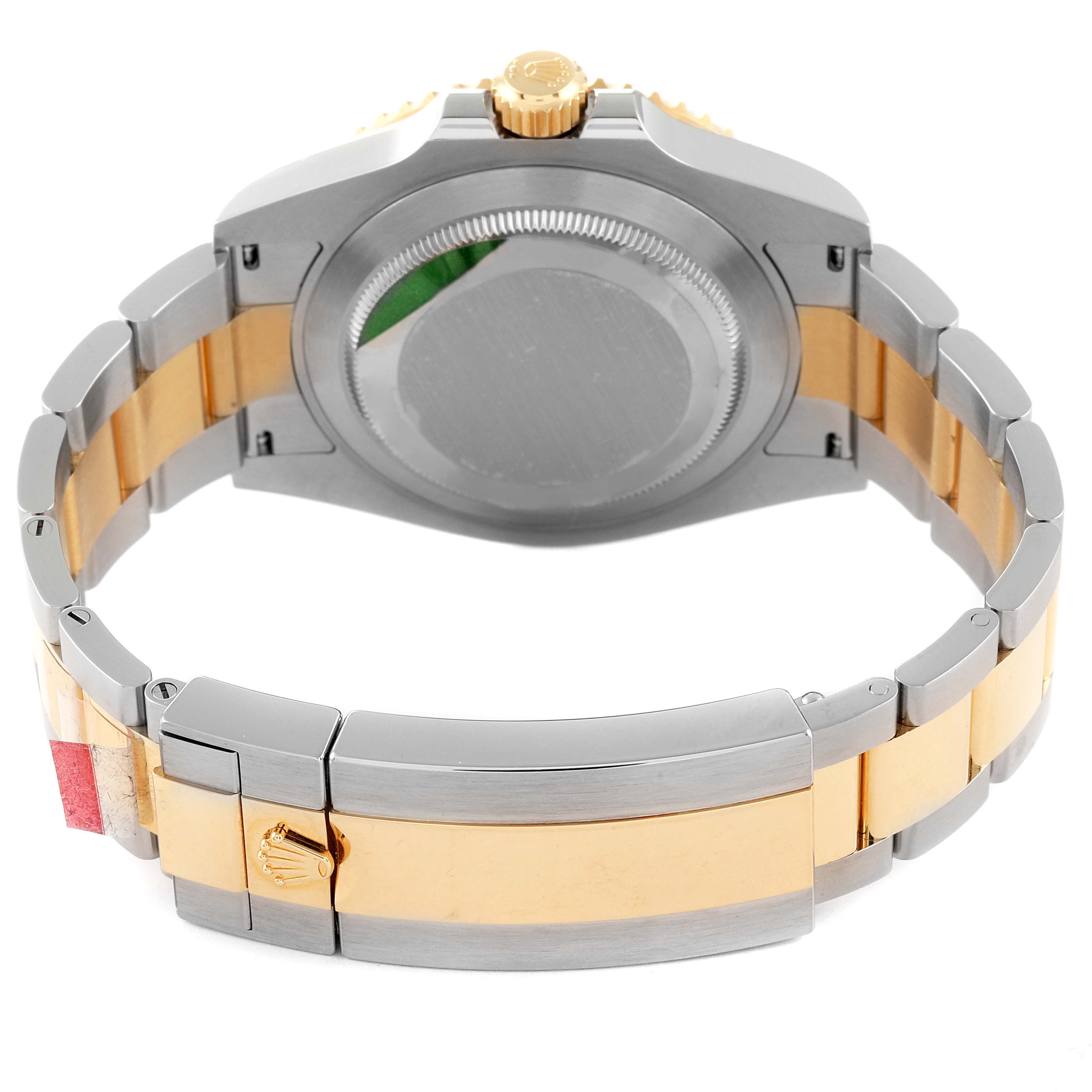 The image shows the back view of a Rolex Submariner 126613 Men's Steel and Gold (two tone) Black Dial 126613 Men's Steel and Gold (two tone) Black Dial watch with a two-tone bracelet and clasp.