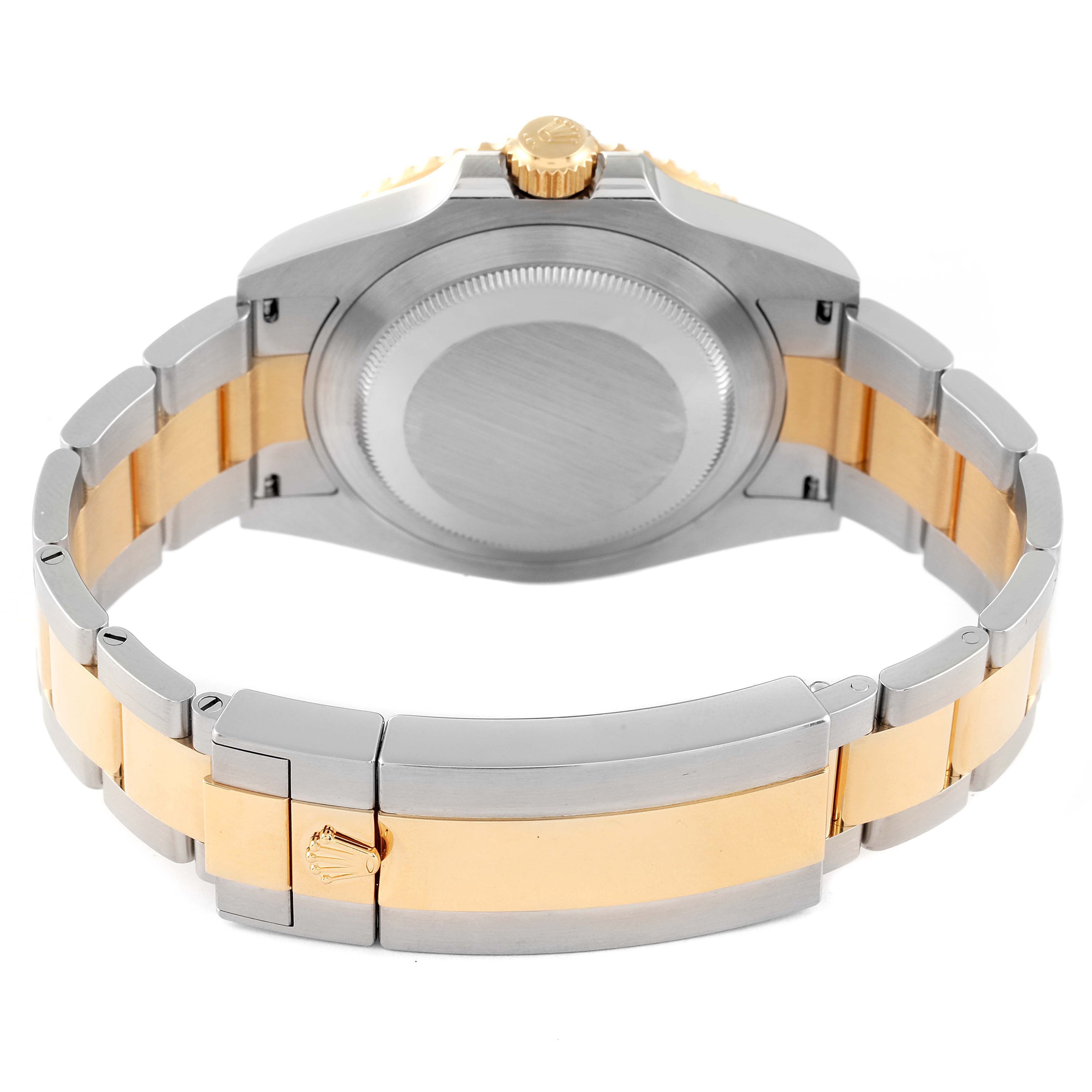 The image shows the backside of the Rolex Submariner 126613 Men's Steel and Gold (two tone) Blue Dial 126613 Men's Steel and Gold (two tone) Blue Dial watch, highlighting the case back and the two-tone bracelet.