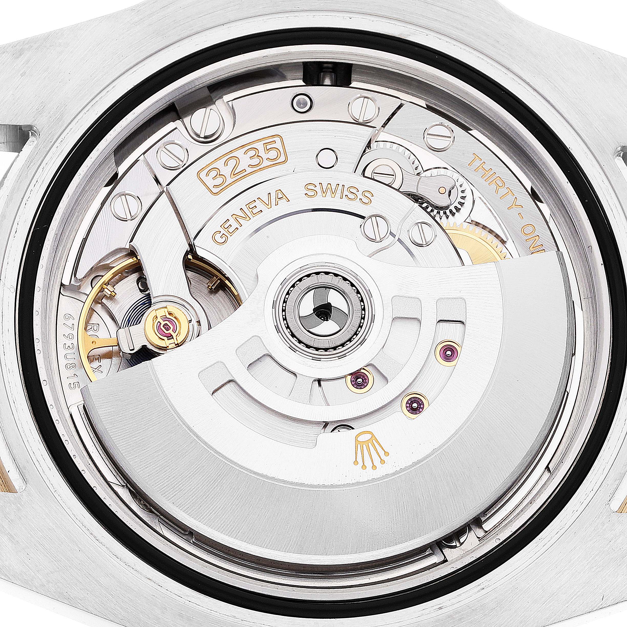 This image shows the internal movement parts of a Rolex Submariner 126613 Men's Steel and Gold (two tone) Blue Dial 126613 Men's Steel and Gold (two tone) Blue Dial watch from a close-up angle.