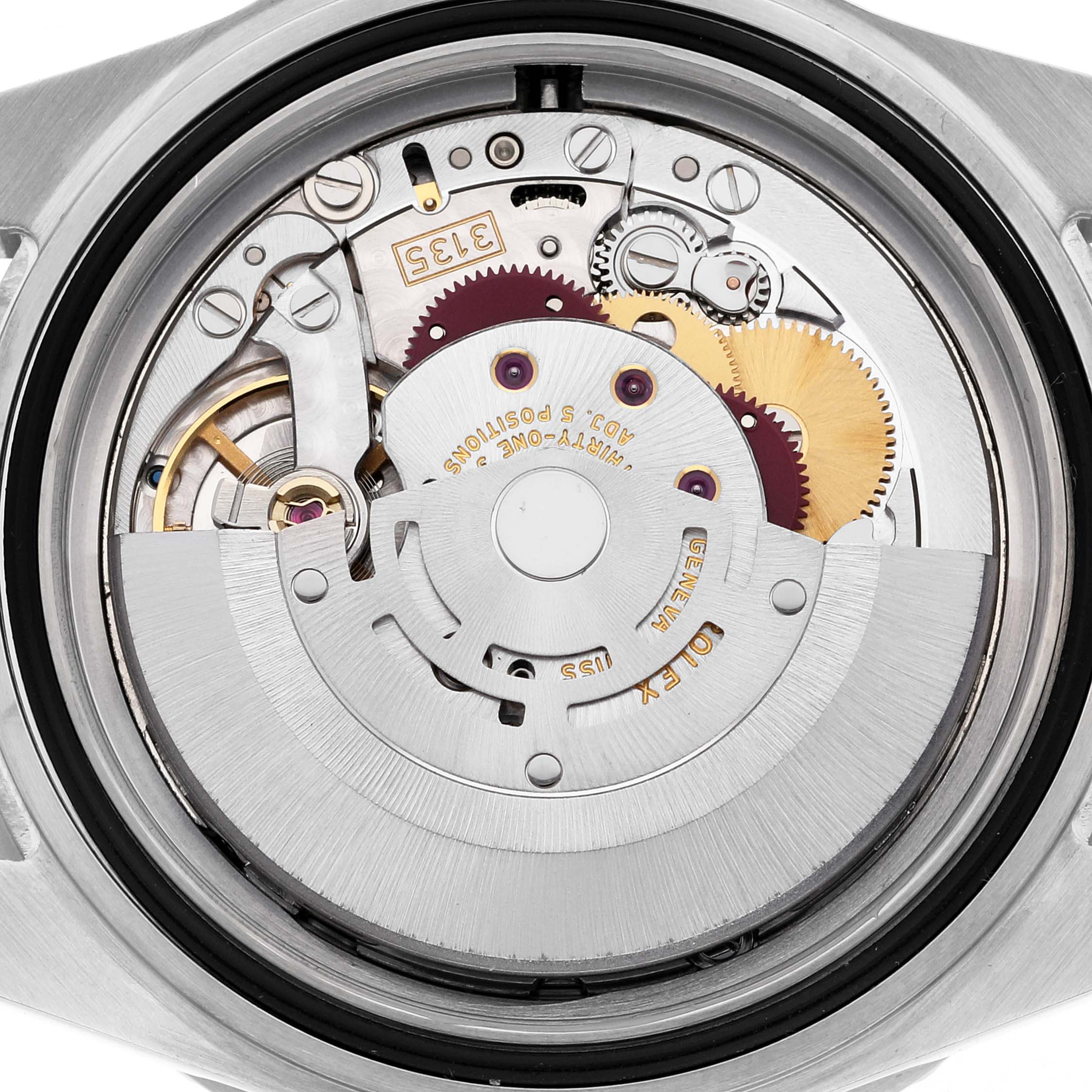 This image shows a close-up view of the movement mechanism inside a Rolex Submariner 16610 Men
s Stainless Steel Black Dial 16610 Men
s Stainless Steel Black Dial watch.
