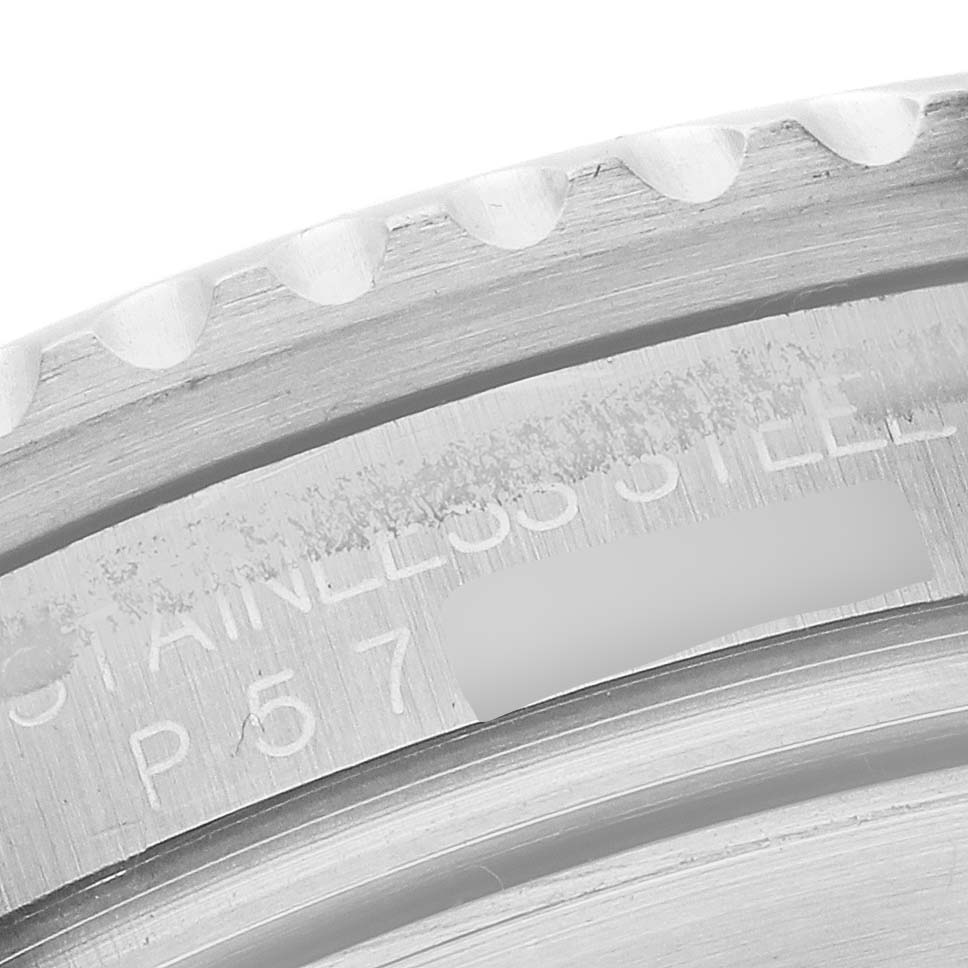 The image shows a close-up of the stainless steel case back and edging of the Rolex Submariner 16610 Men
s Stainless Steel Black Dial 16610 Men
s Stainless Steel Black Dial watch.