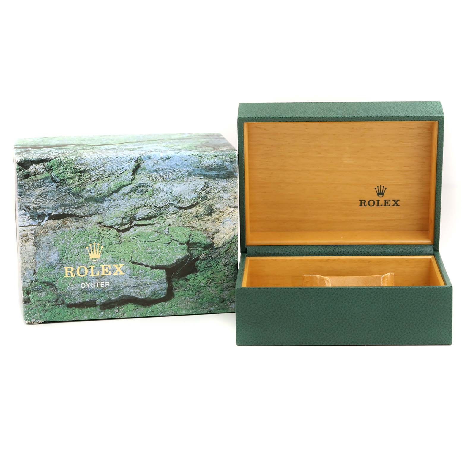 The image shows an open Rolex Submariner 16610 Men
s Stainless Steel Black Dial 16610 Men
s Stainless Steel Black Dial watch box and its outer packaging featuring the Rolex logo.