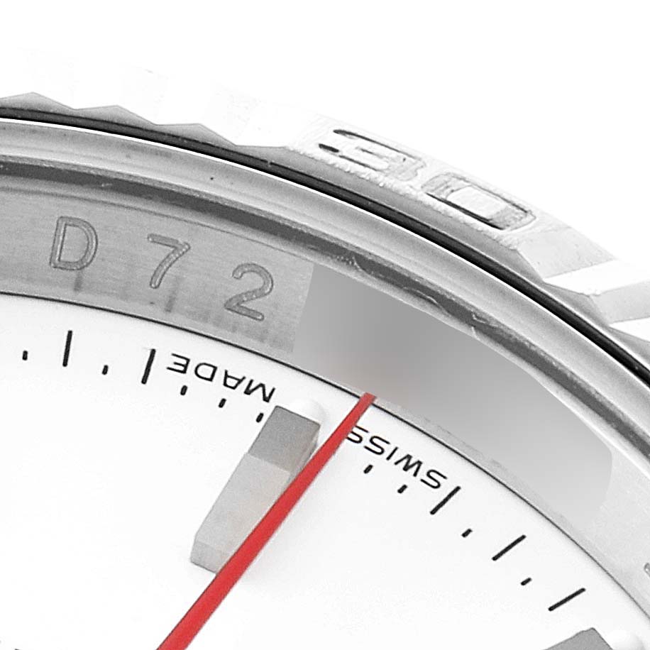 The image shows a close-up of the bezel and part of the dial of a Rolex Turn-o-Graph 116264 Men
s Stainless Steel White Dial 116264 Men
s Stainless Steel White Dial watch.