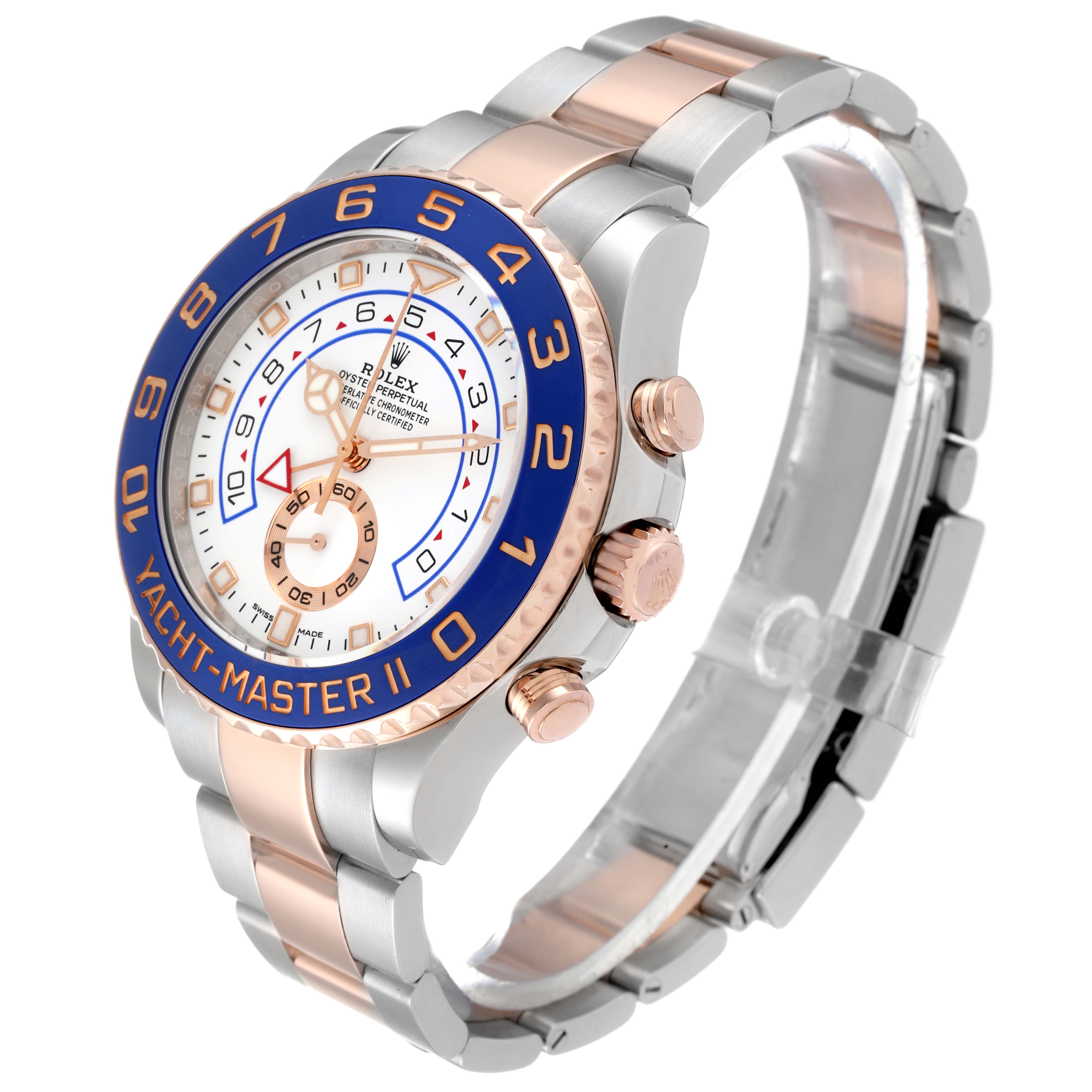 The image shows a Rolex Yacht-Master 116681 Men's Steel and Gold (two tone) White Dial 116681 Men's Steel and Gold (two tone) White Dial II watch at a front angle, highlighting its blue bezel, dial, and two-tone bracelet.