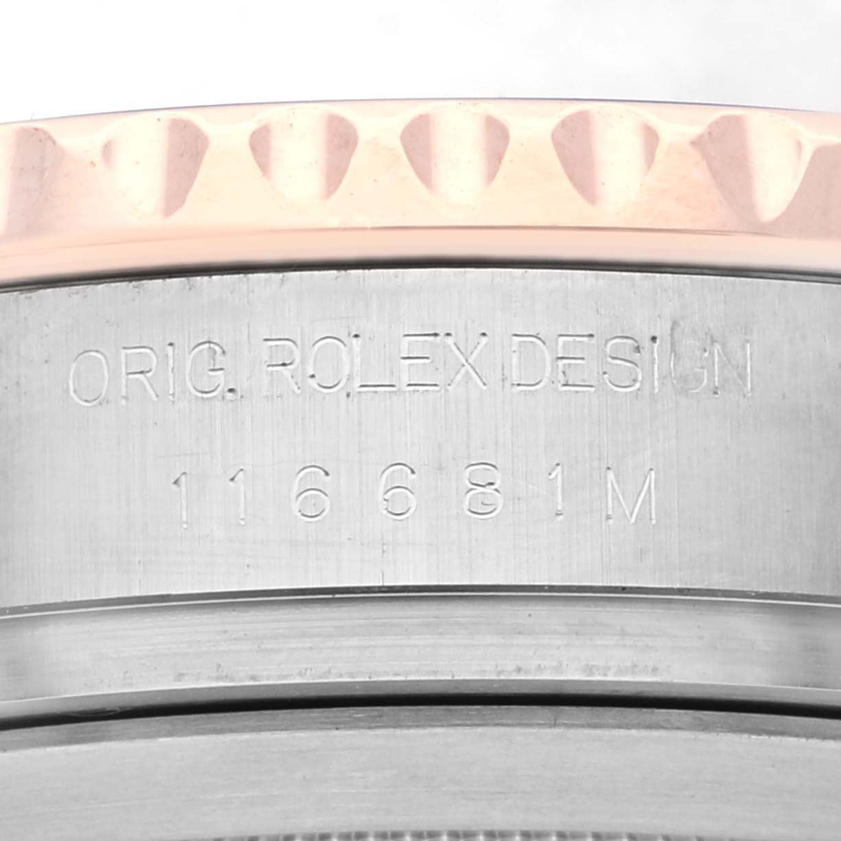 This close-up image shows the side of the Rolex Yacht-Master 116681 Men's Steel and Gold (two tone) White Dial 116681 Men's Steel and Gold (two tone) White Dial watch case, highlighting its model number 116681.