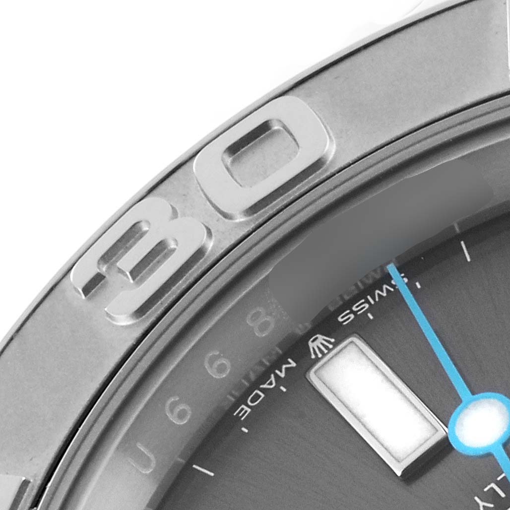 This image shows a close-up of the bezel, part of the dial, and the hour hand of the Rolex Yacht-Master 126622 Men's Stainless Steel Grey Dial 126622 Men's Stainless Steel Grey Dial watch.