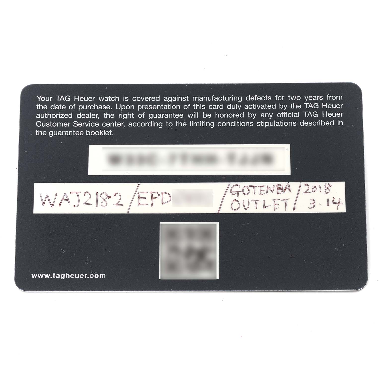 This image shows a warranty card for the Tag Heuer Aquaracer WAJ2182 Men's Titanium Black Dial WAJ2182 Men's Titanium Black Dial watch model WAJ2182, with handwritten details including purchase location and date.