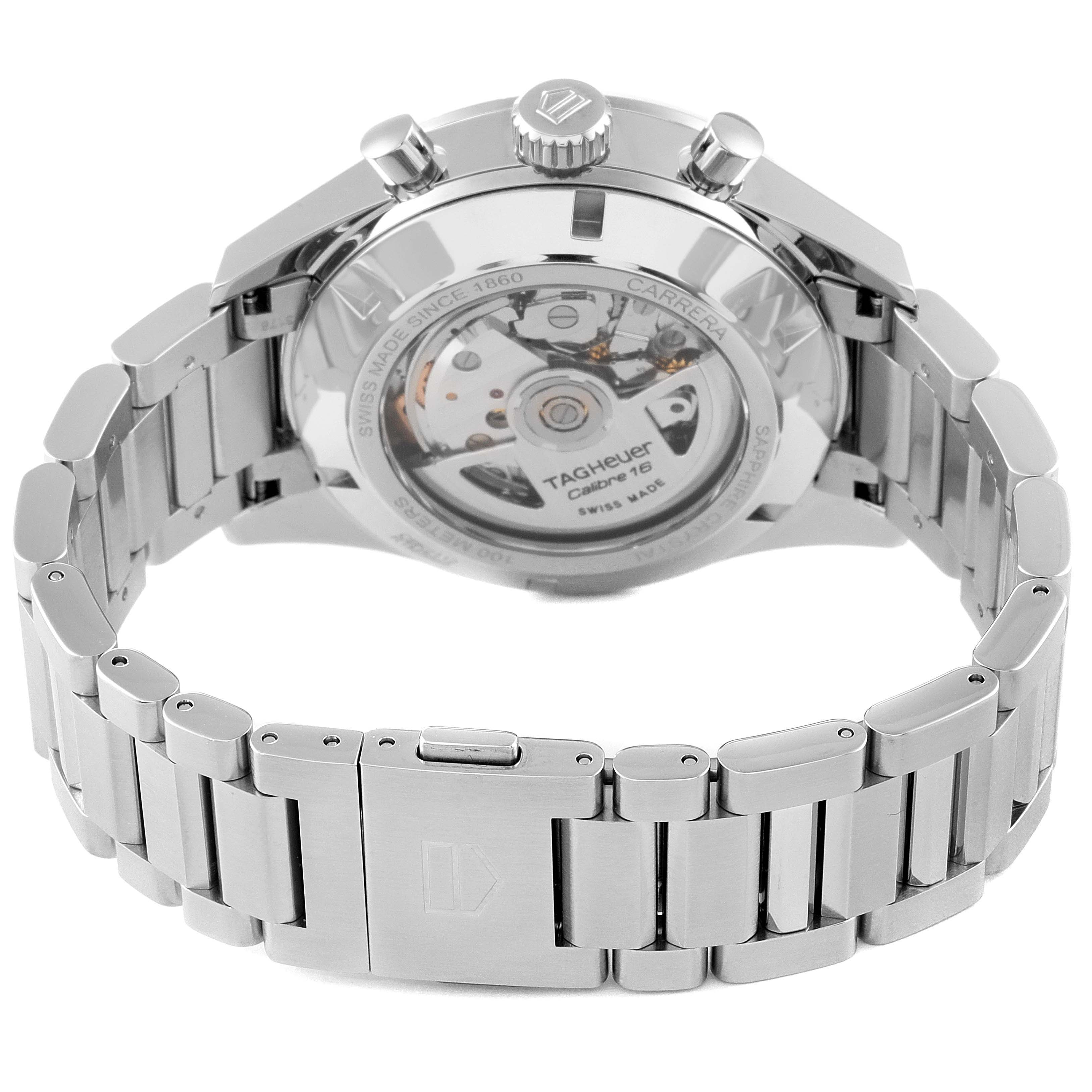 The image shows the Tag Heuer Carrera CBK2112.BA0715 Men
s Stainless Steel Blue Dial CBK2112.BA0715 Men
s Stainless Steel Blue Dial model watch from a rear angle, highlighting the movement mechanism and stainless steel bracelet.