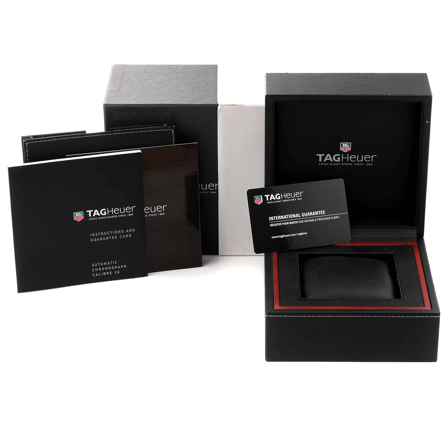 The image shows the packaging and accessories for a Tag Heuer Carrera CV2A10.BA0796 Men
s Stainless Steel Black Dial CV2A10.BA0796 Men
s Stainless Steel Black Dial watch, including the box, instruction manual, and guarantee card.