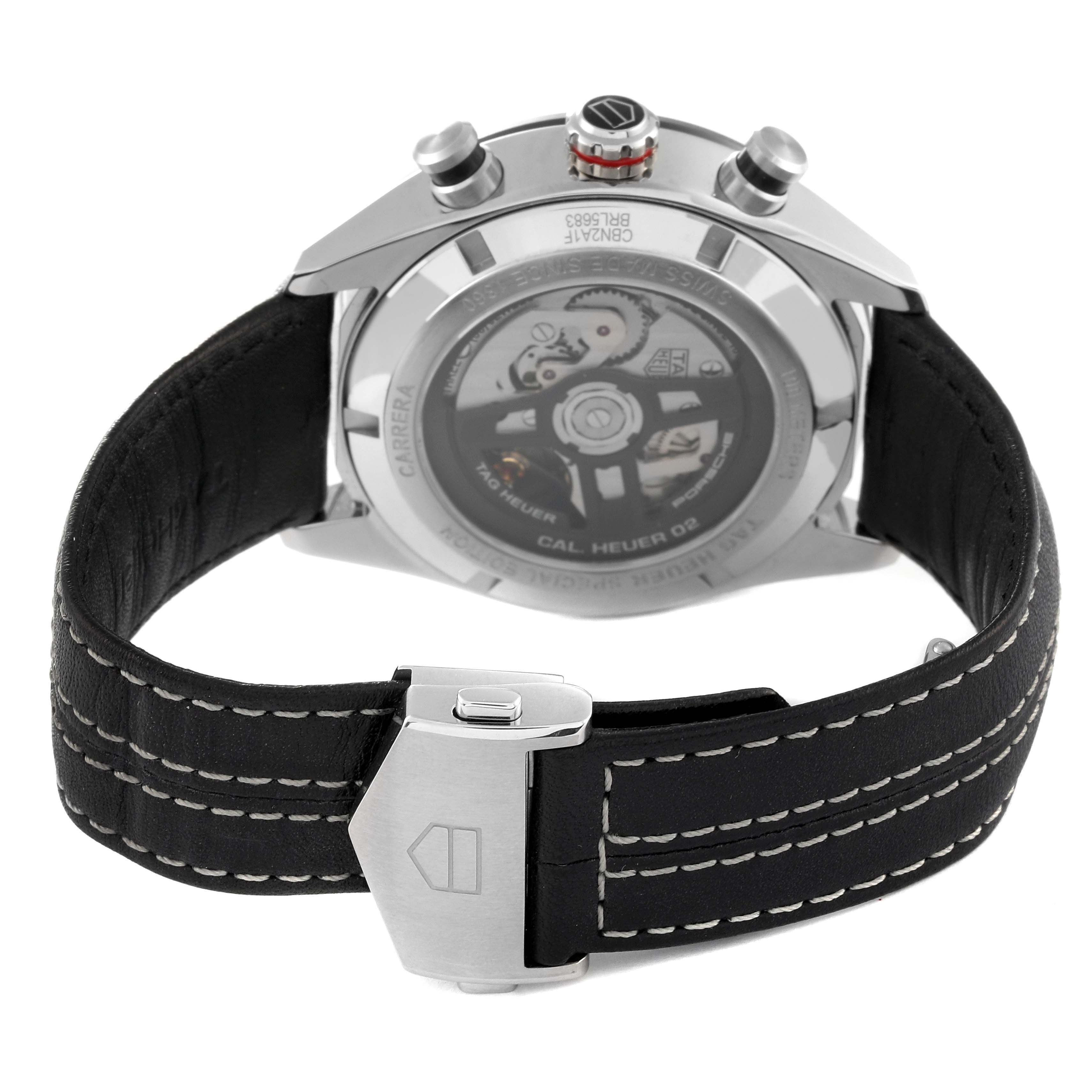 The image shows the back view of a Tag Heuer Carrera CBN2A1F.BA0643 Men's Stainless Steel Grey Dial CBN2A1F.BA0643 Men's Stainless Steel Grey Dial watch, highlighting the case back and black leather strap with stitching.