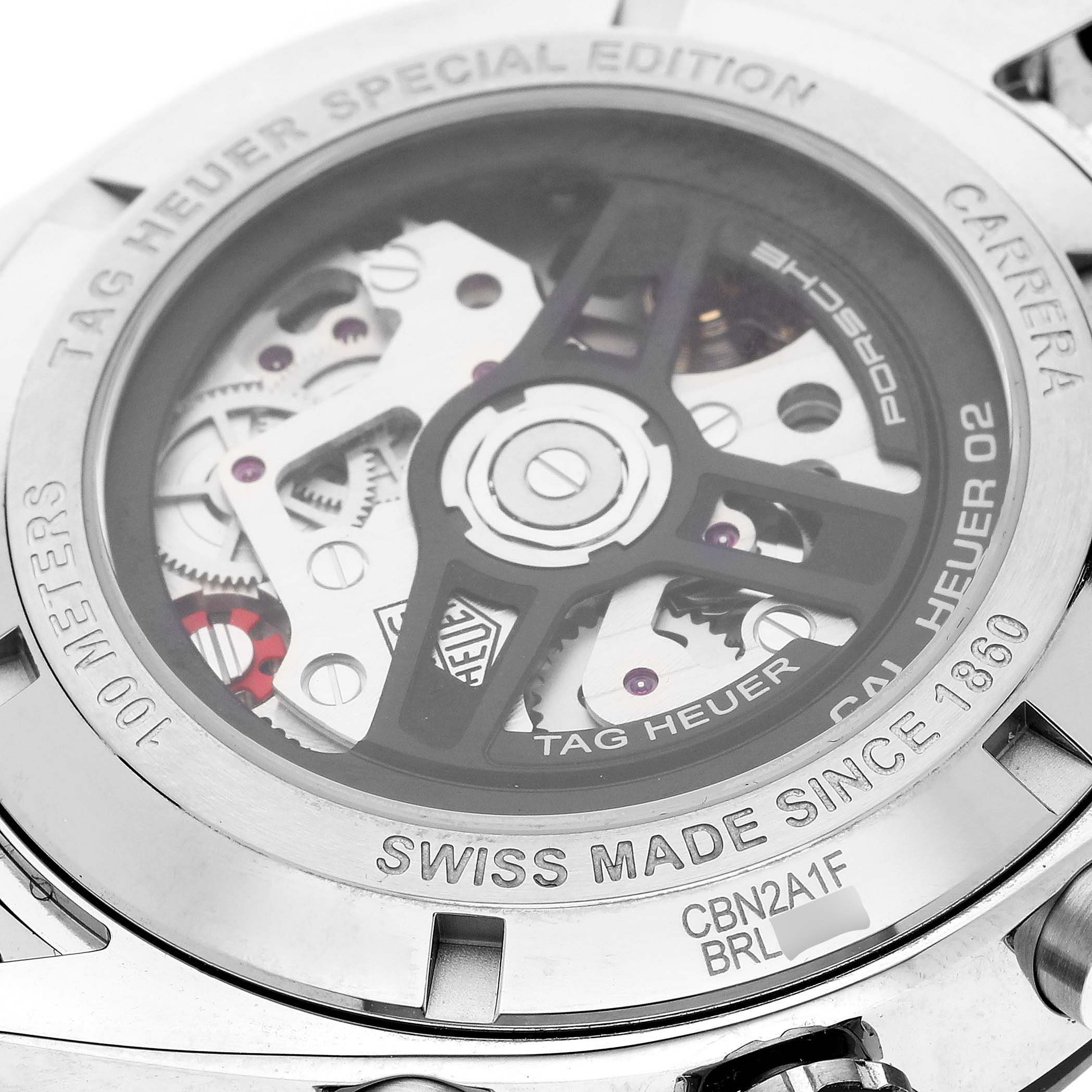 The image shows the back of a Tag Heuer Carrera CBN2A1F.BA0643 Men's Stainless Steel Grey Dial CBN2A1F.BA0643 Men's Stainless Steel Grey Dial watch, highlighting the movement and internal mechanical details.