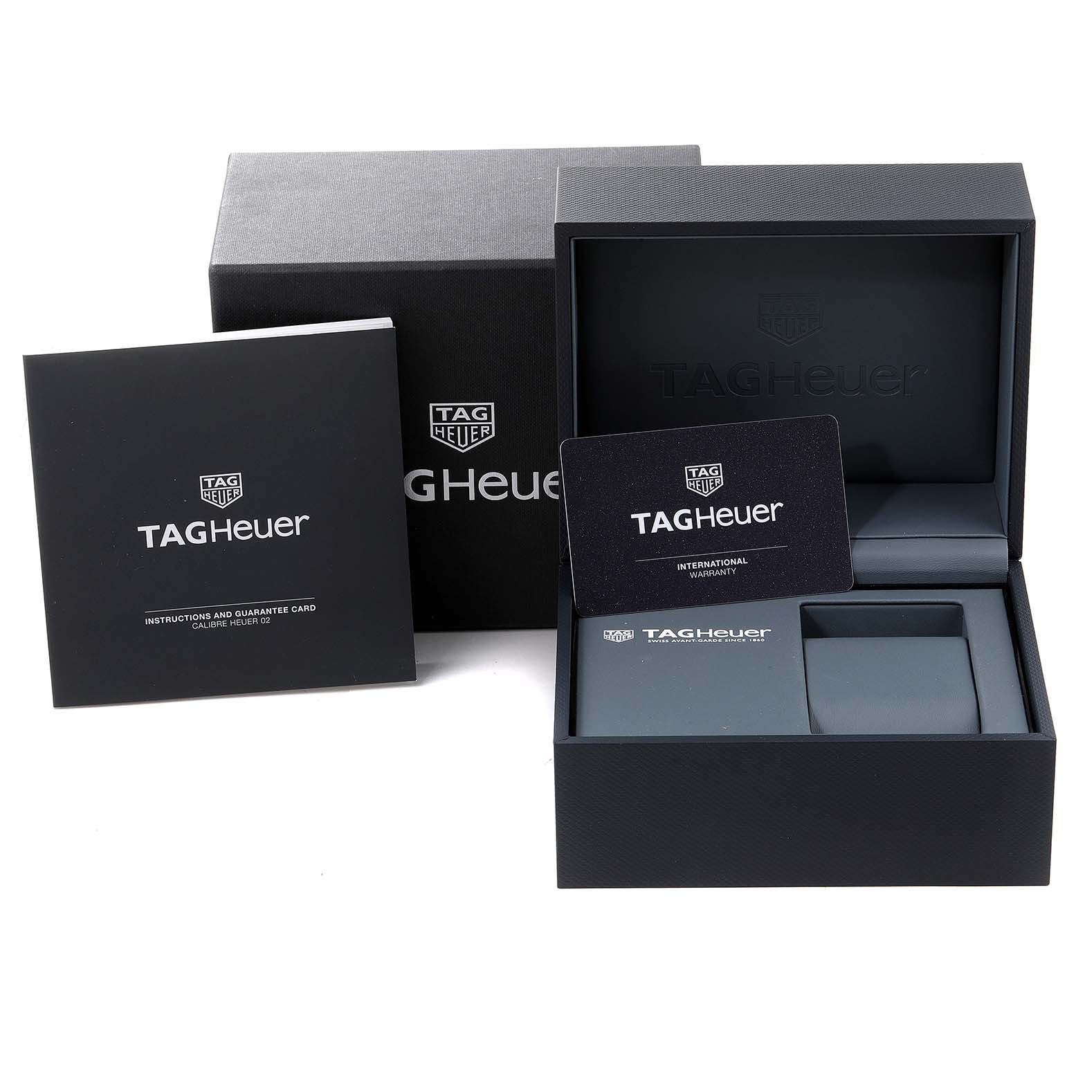 The image shows the Tag Heuer Monaco CBL2111.FC6453 Men's Stainless Steel Blue Dial CBL2111.FC6453 Men's Stainless Steel Blue Dial packaging, including the outer box, watch box, warranty card, and instruction booklet.