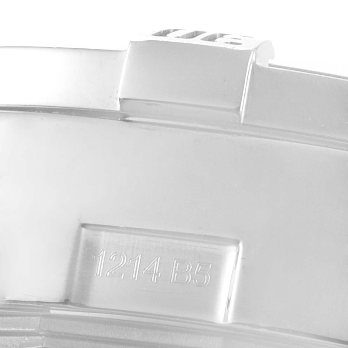 This close-up image shows the clasp of a Breitling Avenger A13381 Men
s Stainless Steel White Dial A13381 Men
s Stainless Steel White Dial watch, highlighting the engraved model code "1214 B5."