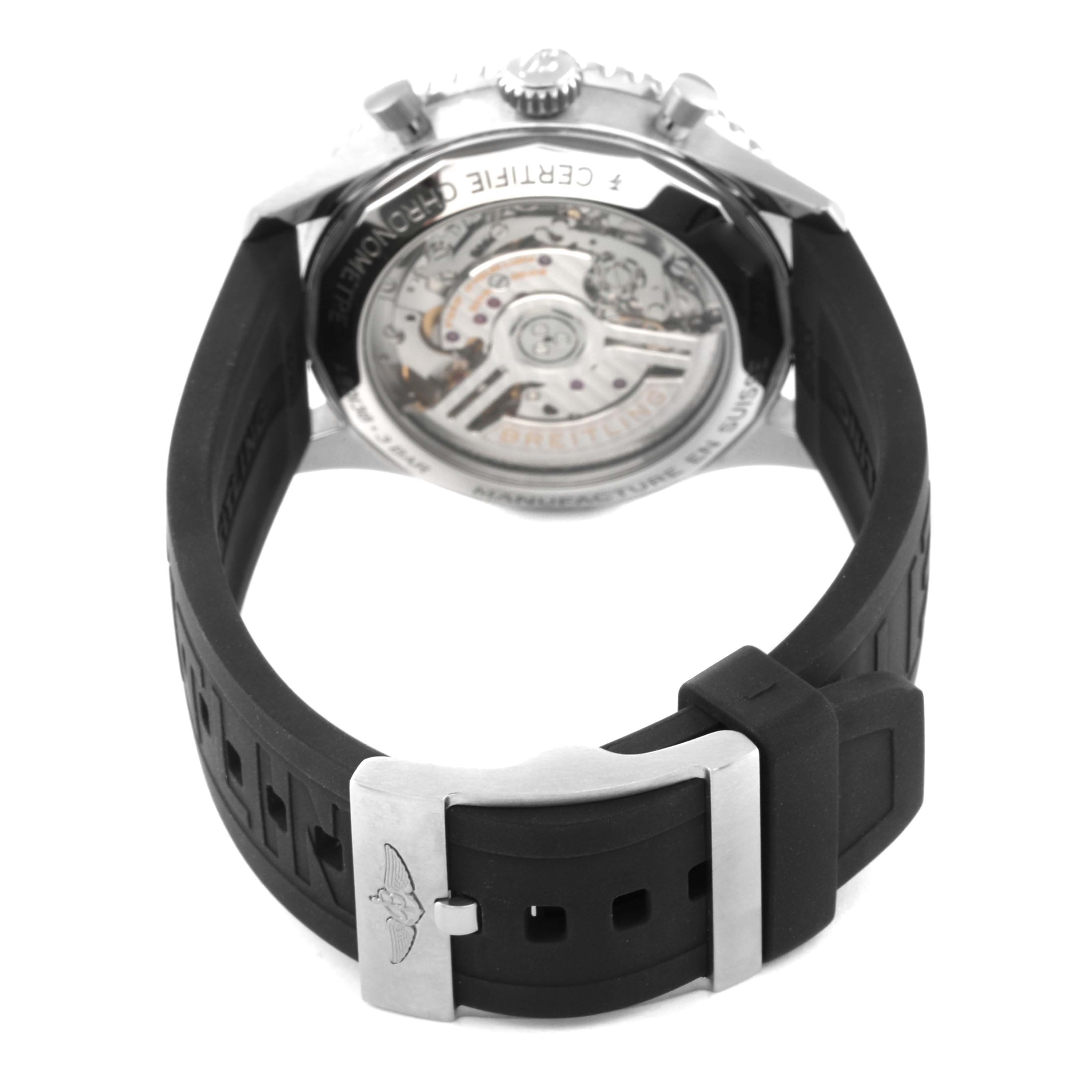 The image shows the back view of a Breitling Navitimer AB0138211B1P1 Men's Stainless Steel Black Dial AB0138211B1P1 Men's Stainless Steel Black Dial watch, focusing on the movement and black rubber strap.