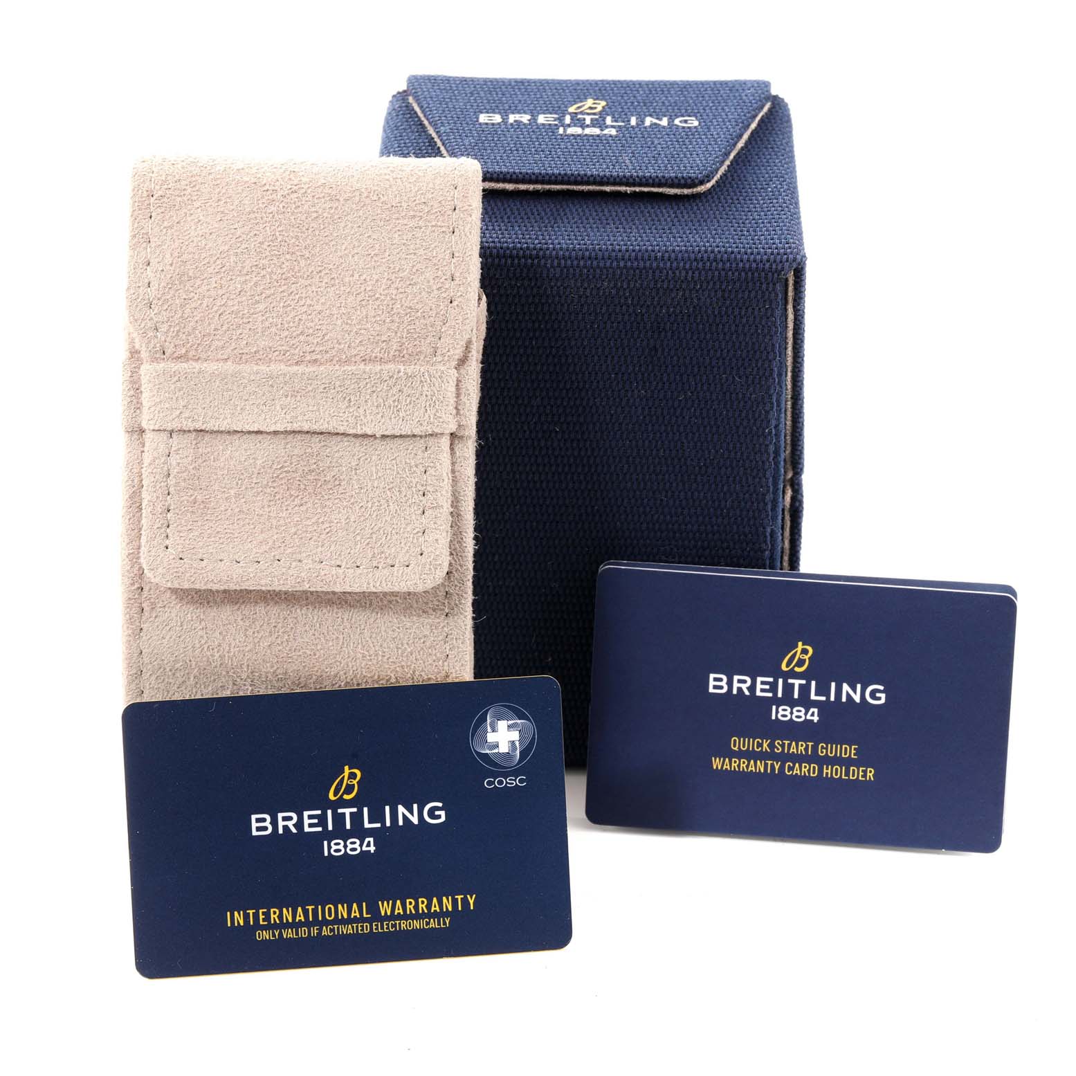 The image shows accessories for the Breitling Navitimer AB0138211B1P1 Men's Stainless Steel Black Dial AB0138211B1P1 Men's Stainless Steel Black Dial, including a beige pouch, a blue box, an international warranty card, and a quick start guide.