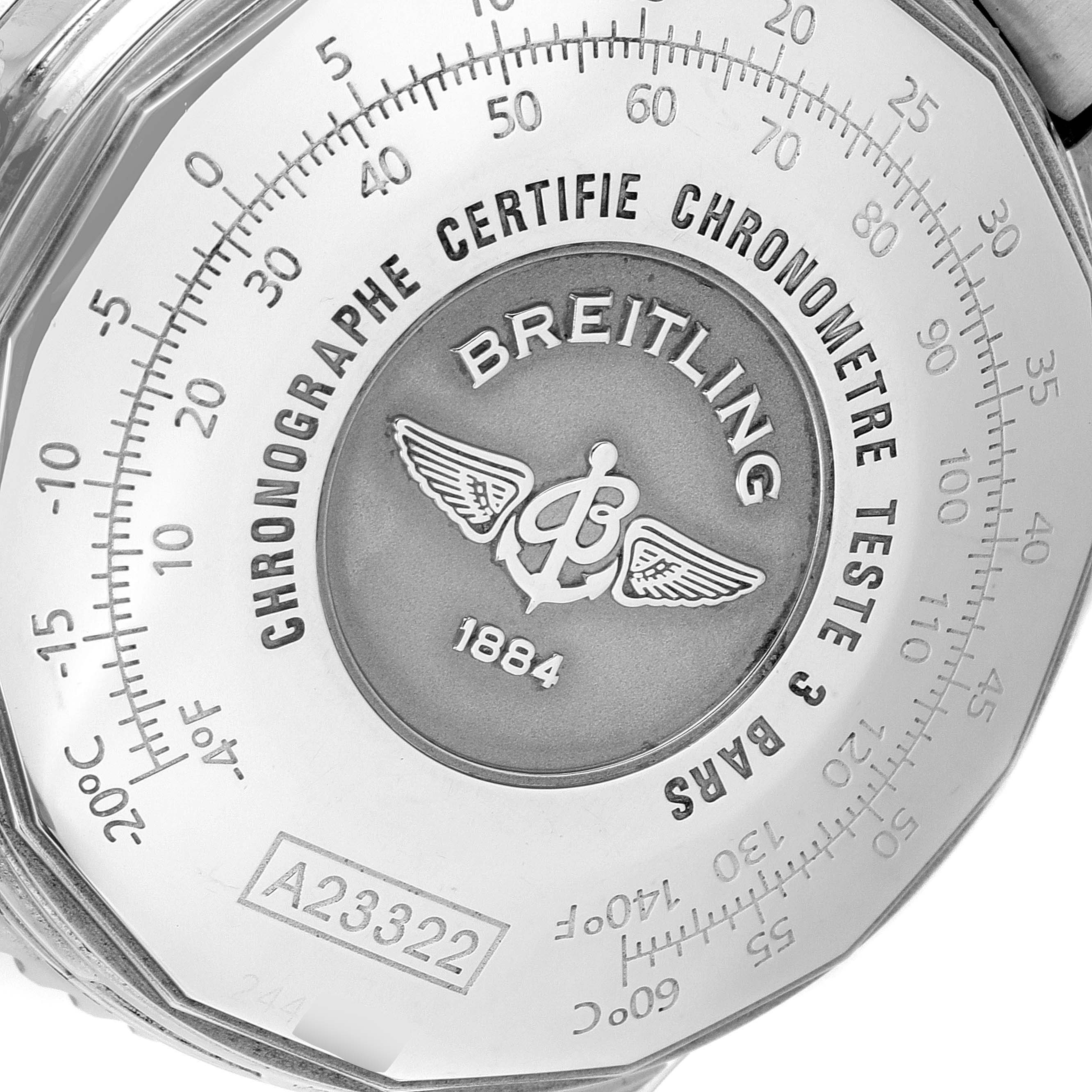 The image shows the back case of a Navitimer model watch by Breitling, displaying the brand logo and certification markings.