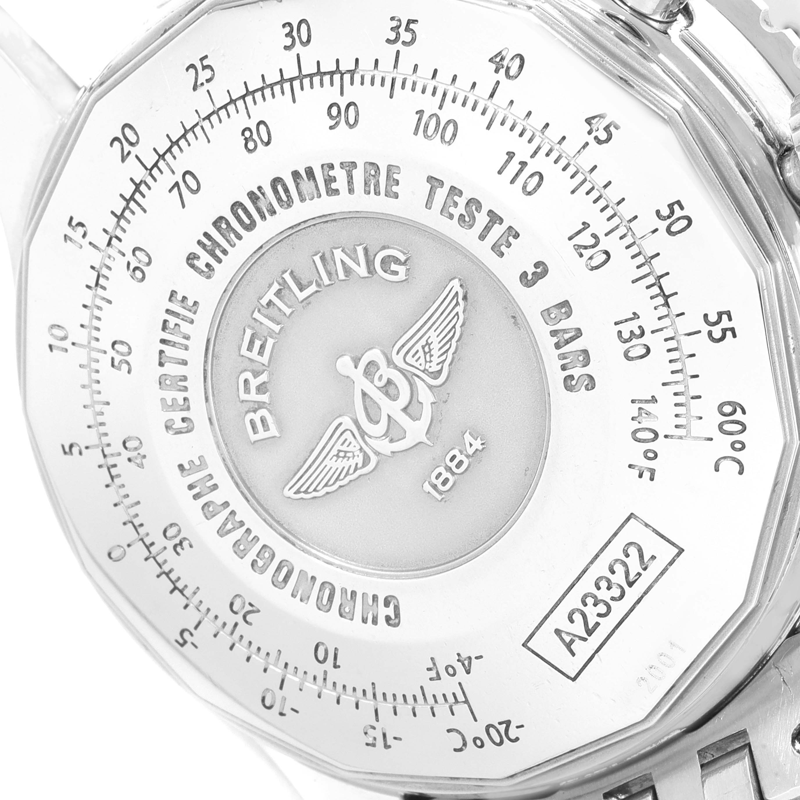 The image shows the back case of a Breitling Navitimer A23322 Men's Stainless Steel Black Dial A23322 Men's Stainless Steel Black Dial watch, displaying brand markings and a conversion scale.