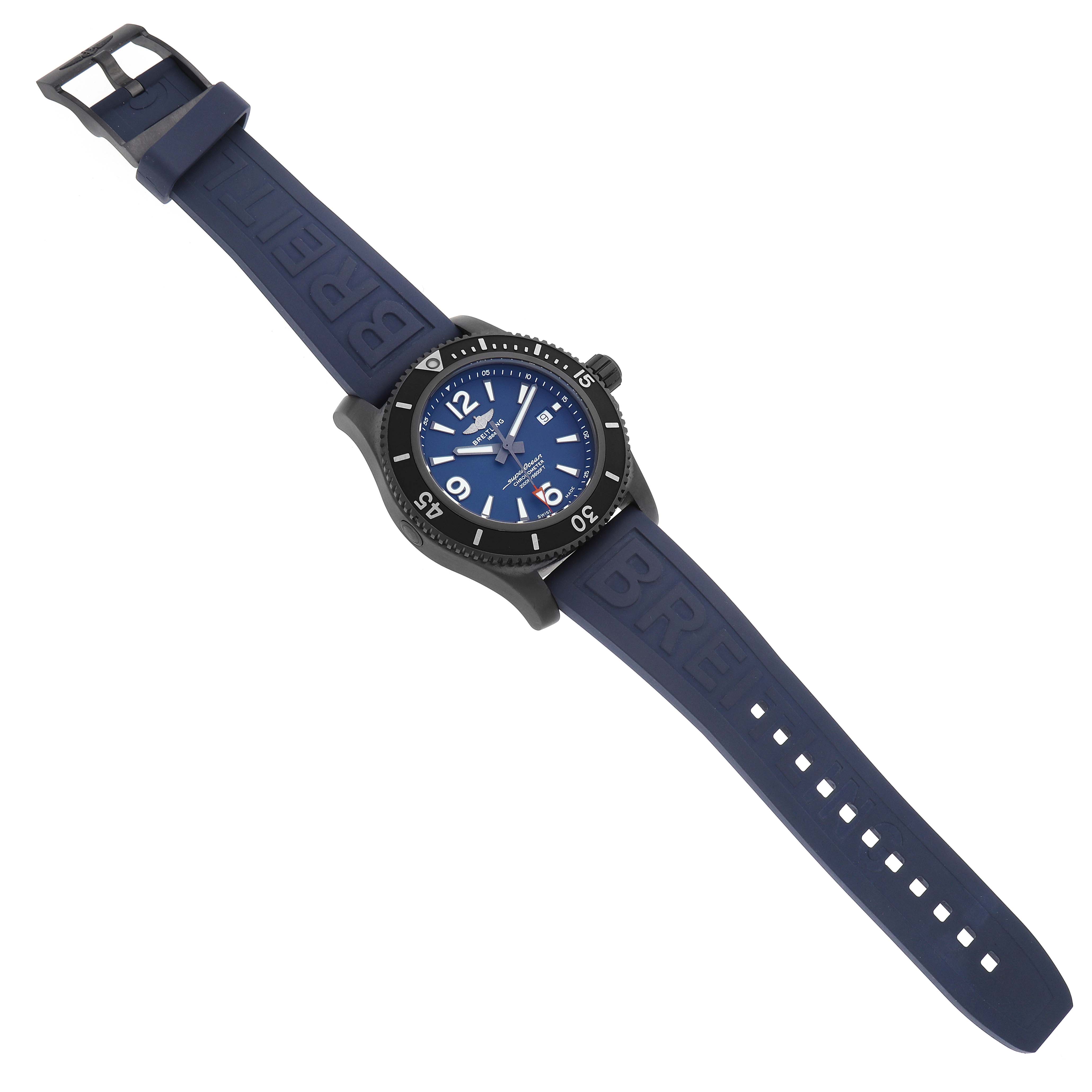 The Breitling Superocean M17368 Men's Stainless Steel Blue Dial watch is shown at a three-quarter angle, highlighting its face, bezel, and navy rubber strap.