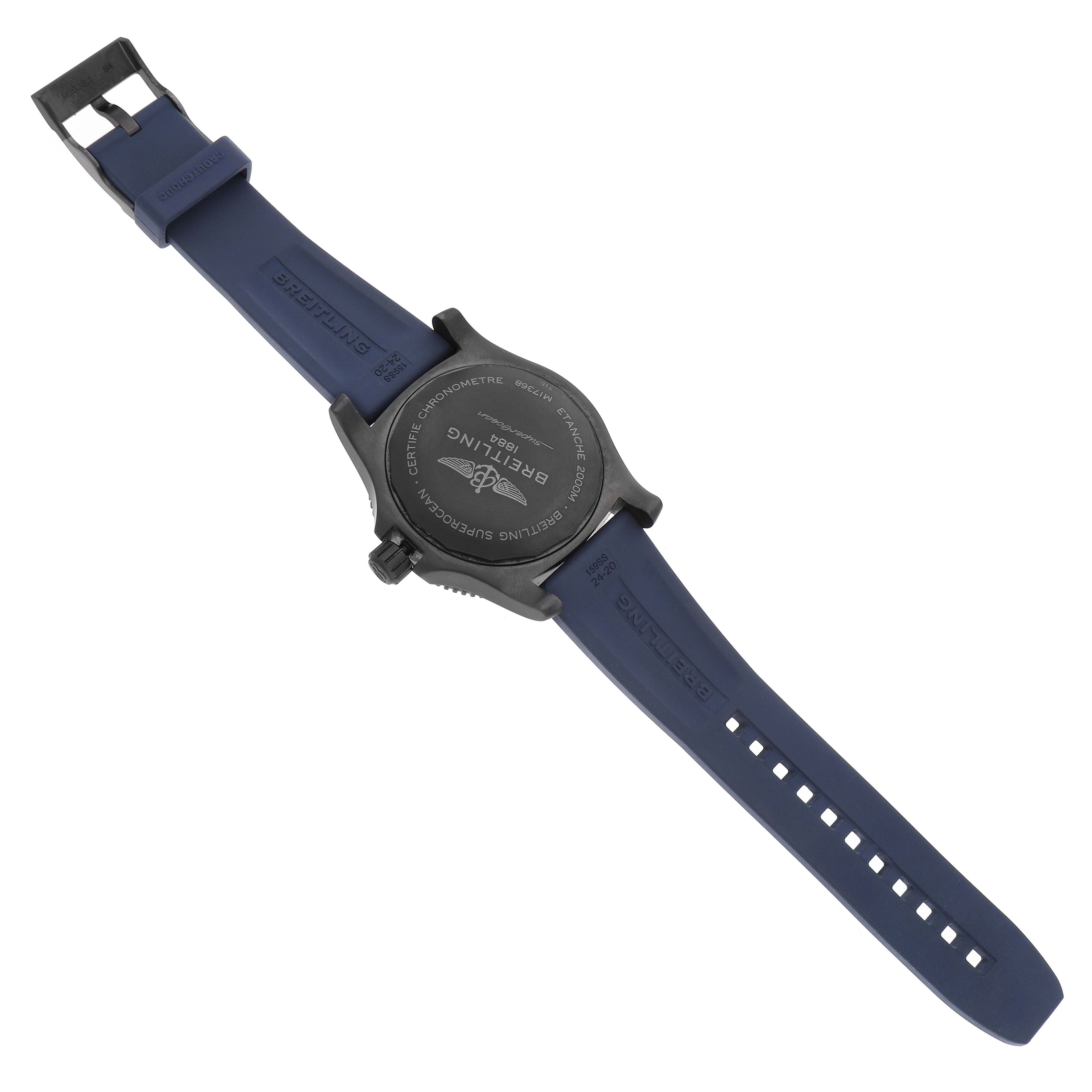 The image shows the back view of a Breitling Superocean M17368 Men's Stainless Steel Blue Dial watch, highlighting the case back and blue strap.